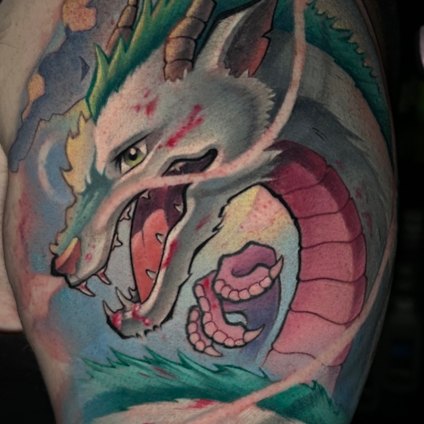 Dragon American traditional tattoo on the shoulder by Jason