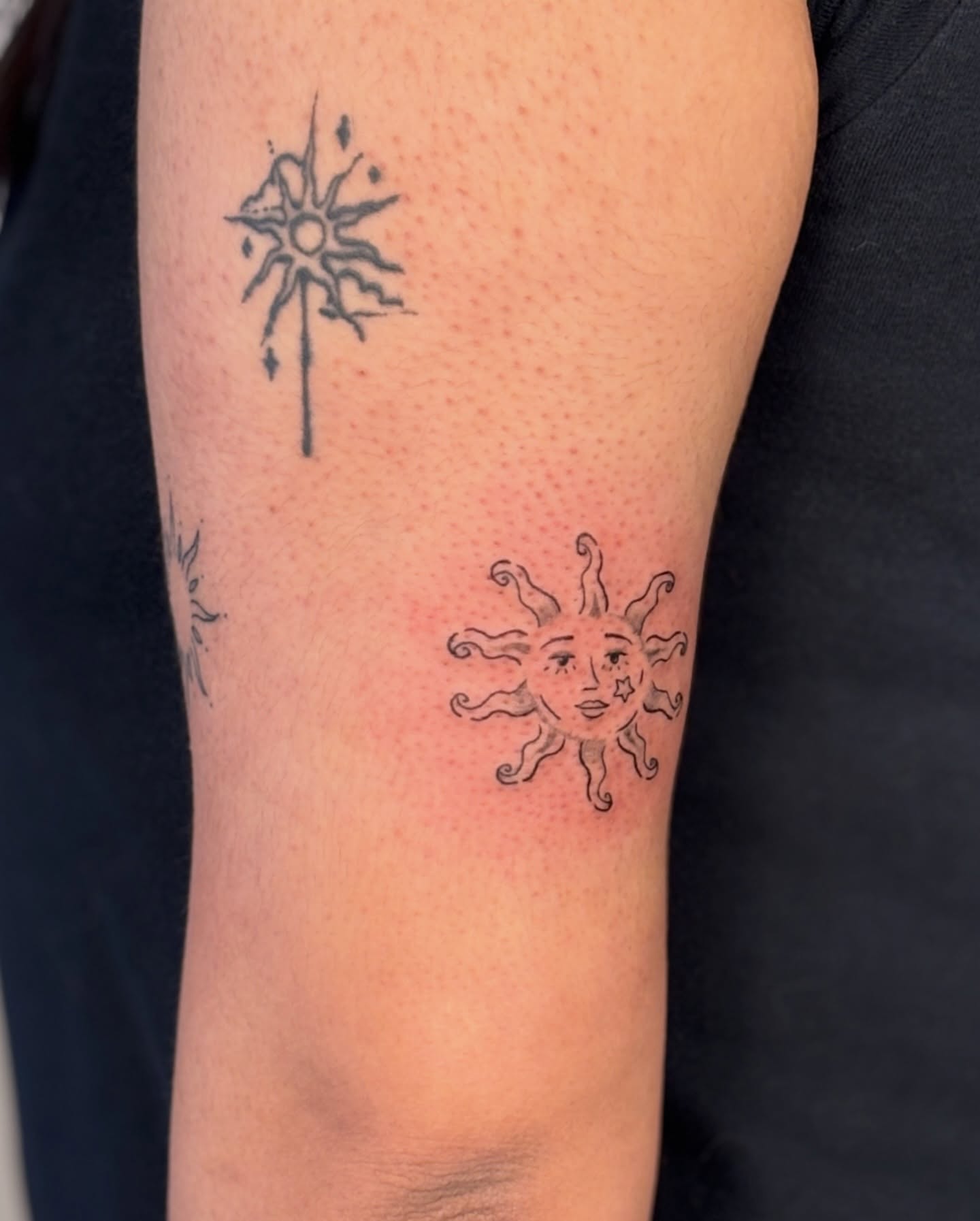Sun and windmill dotwork tattoo on the forearm by Maddie
