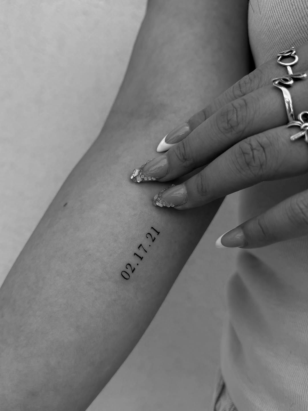 Date 02.17.21 tattoo on the forearm by Abby Robinson