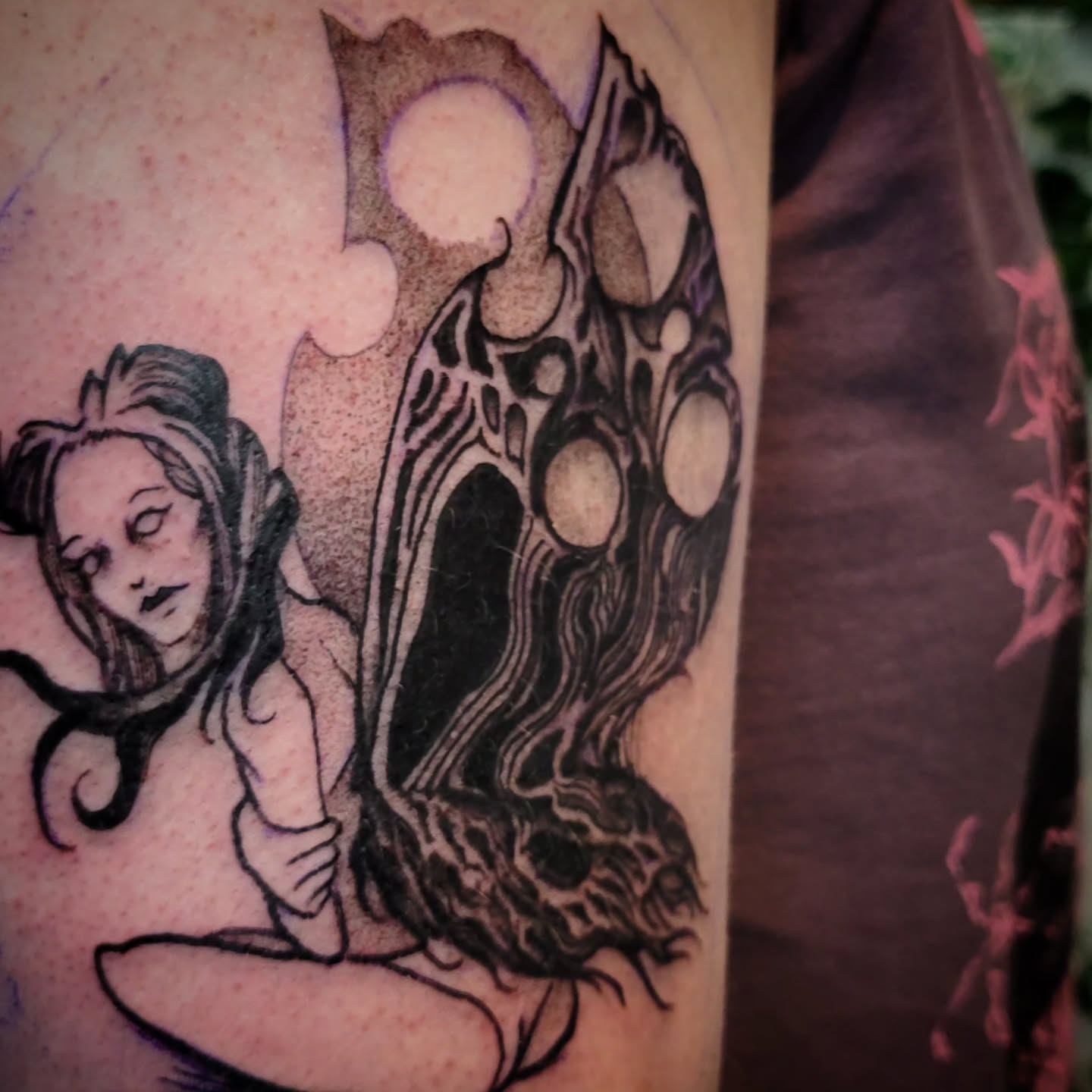 Woman with butterfly wings realism tattoo on the forearm by Uku Tattoos, Cambridge, England