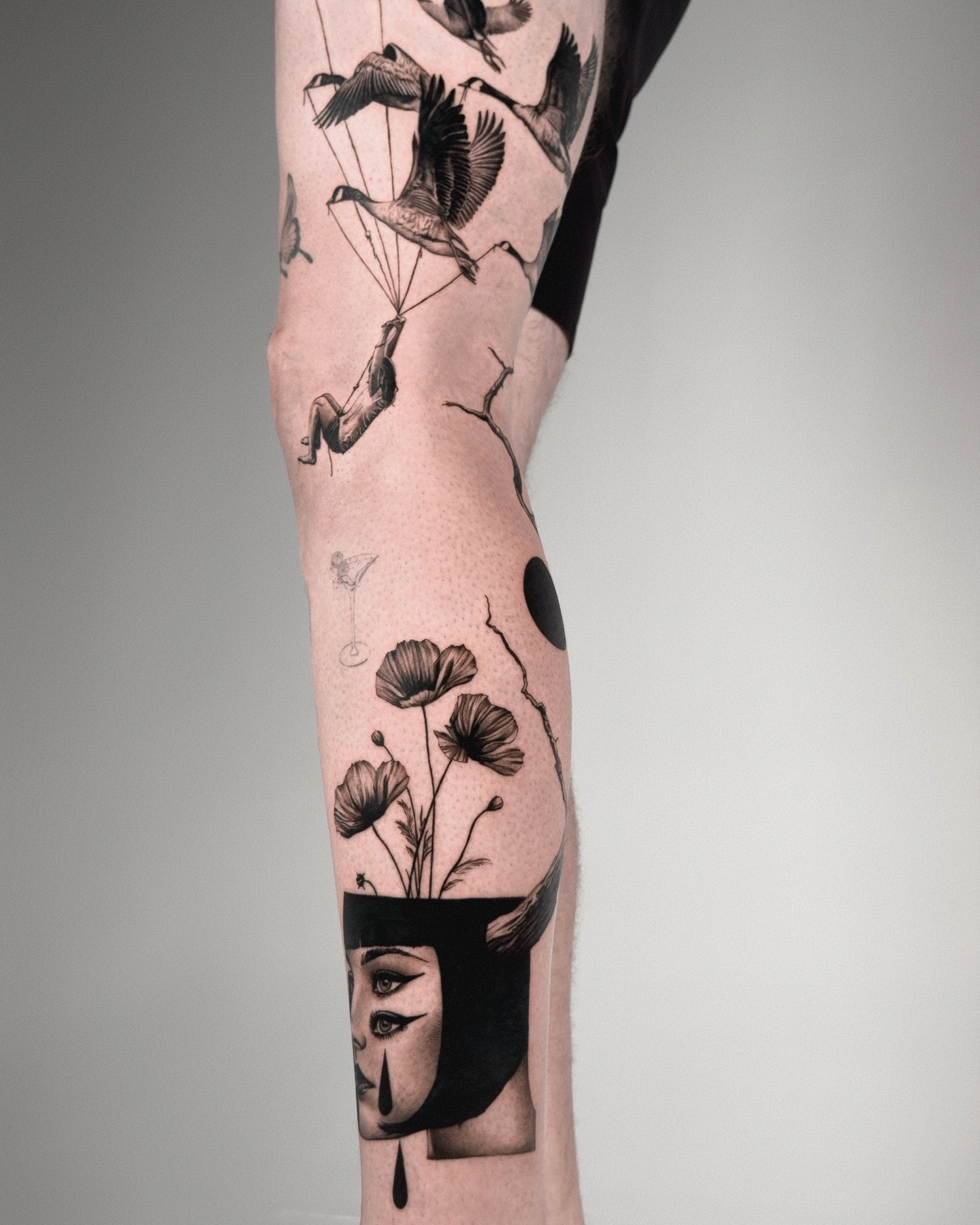 Woman's face with flowers dotwork tattoo on the forearm by Henko
