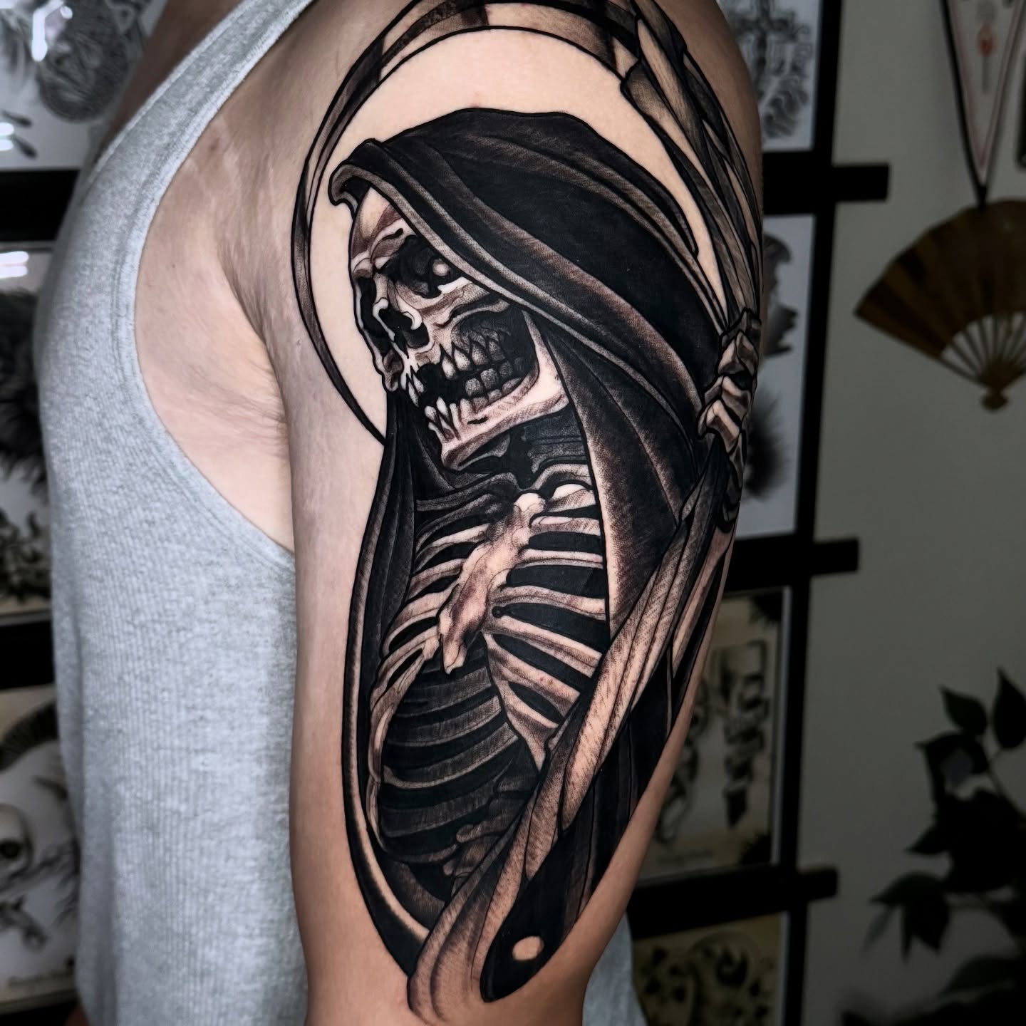 Grim reaper dark realism tattoo on the shoulder by Golden Heart Tattoo Co