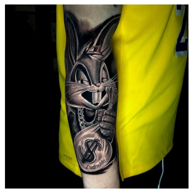 Looney tunes character black and grey tattoo on the forearm by Elijah Tattoos, San Diego, California