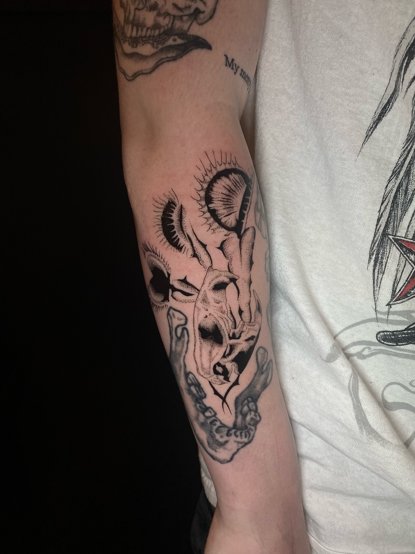 Skull and hands realism tattoo on the forearm by Cherry Jane 🍒