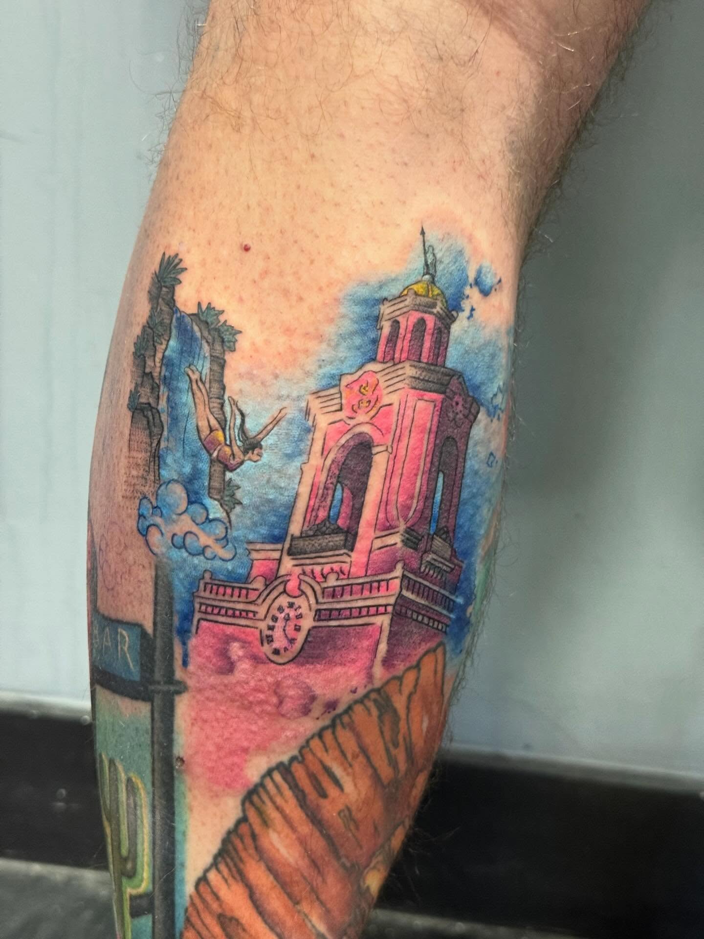 Church and palm trees watercolor tattoo on the forearm by Katrina Aldaco 🧿 Tattoo Artist