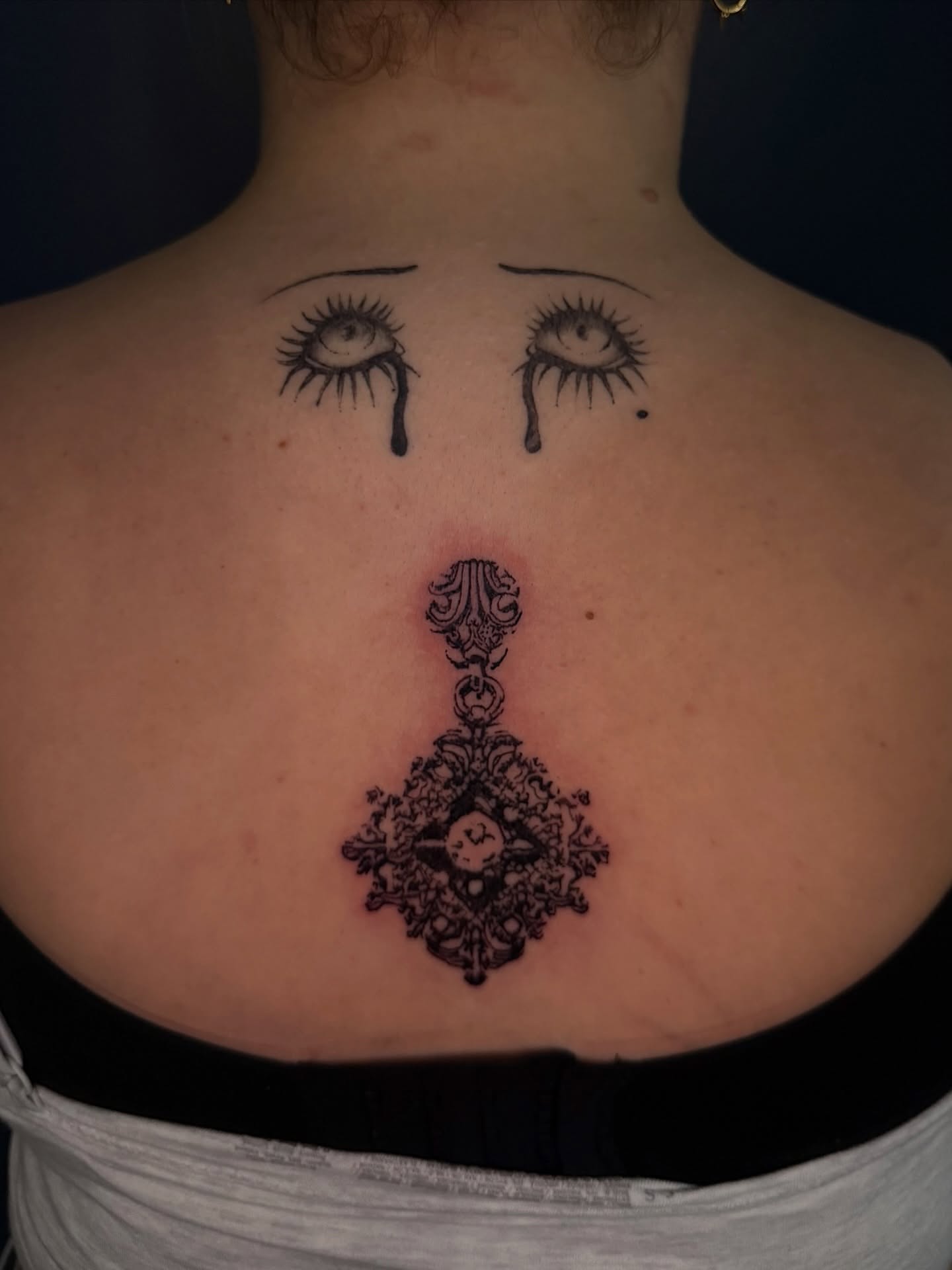 Teardrop eyes geometric tattoo on the back by ༺♡༻ Melia’s Dolls ༺♡༻