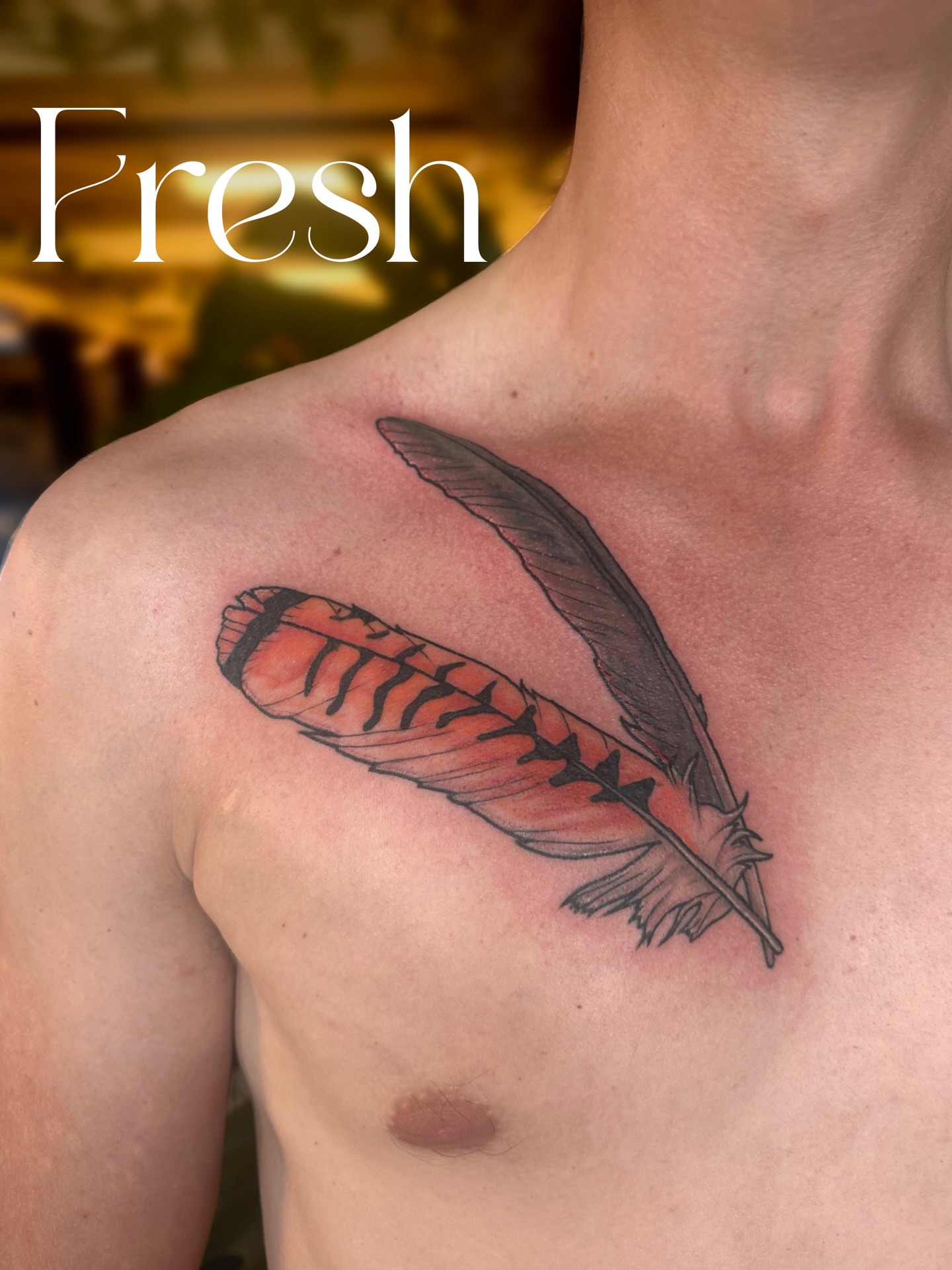 Feather realism tattoo on the chest by Ransom