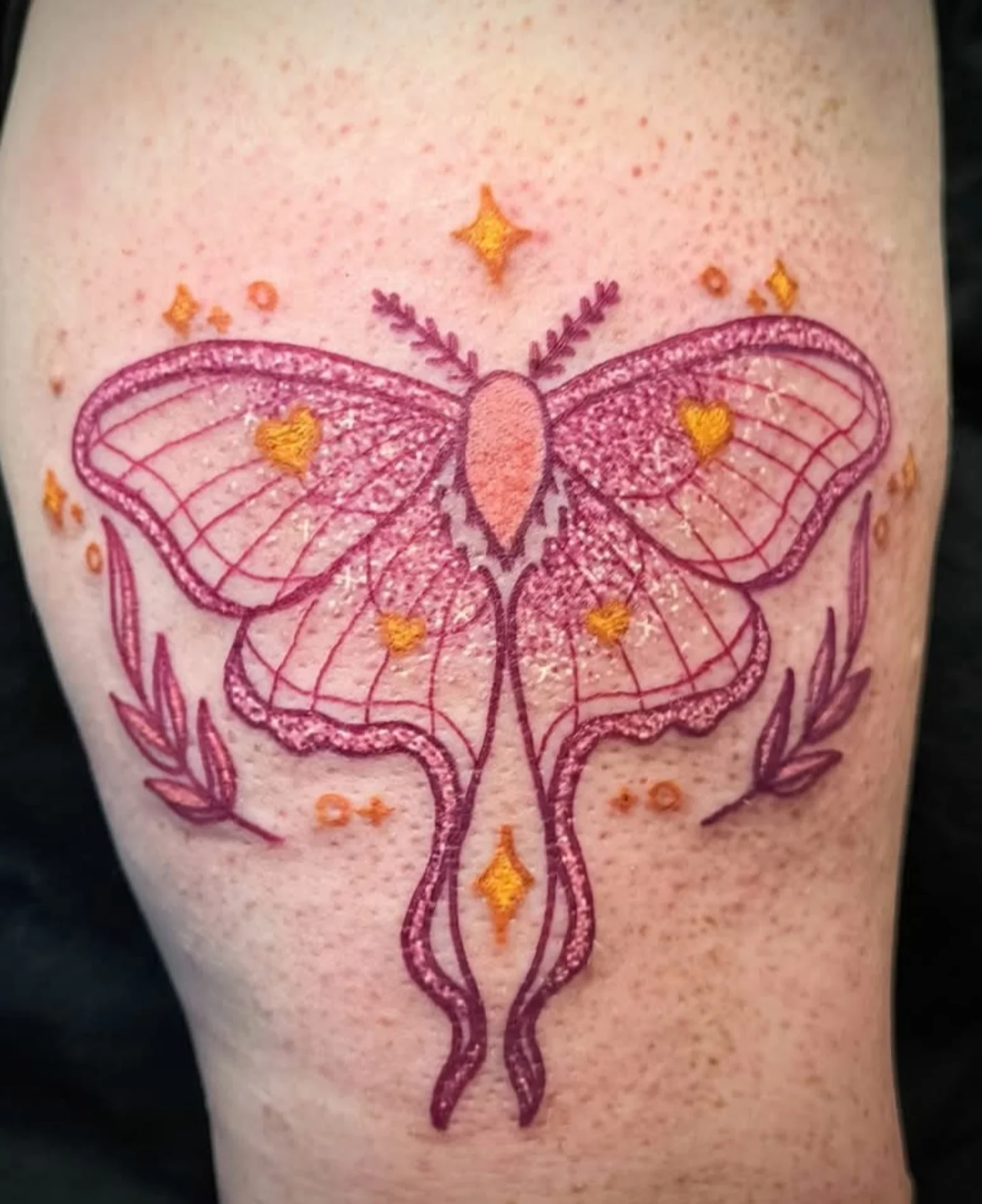 Butterfly dotwork tattoo on the thigh by Reid