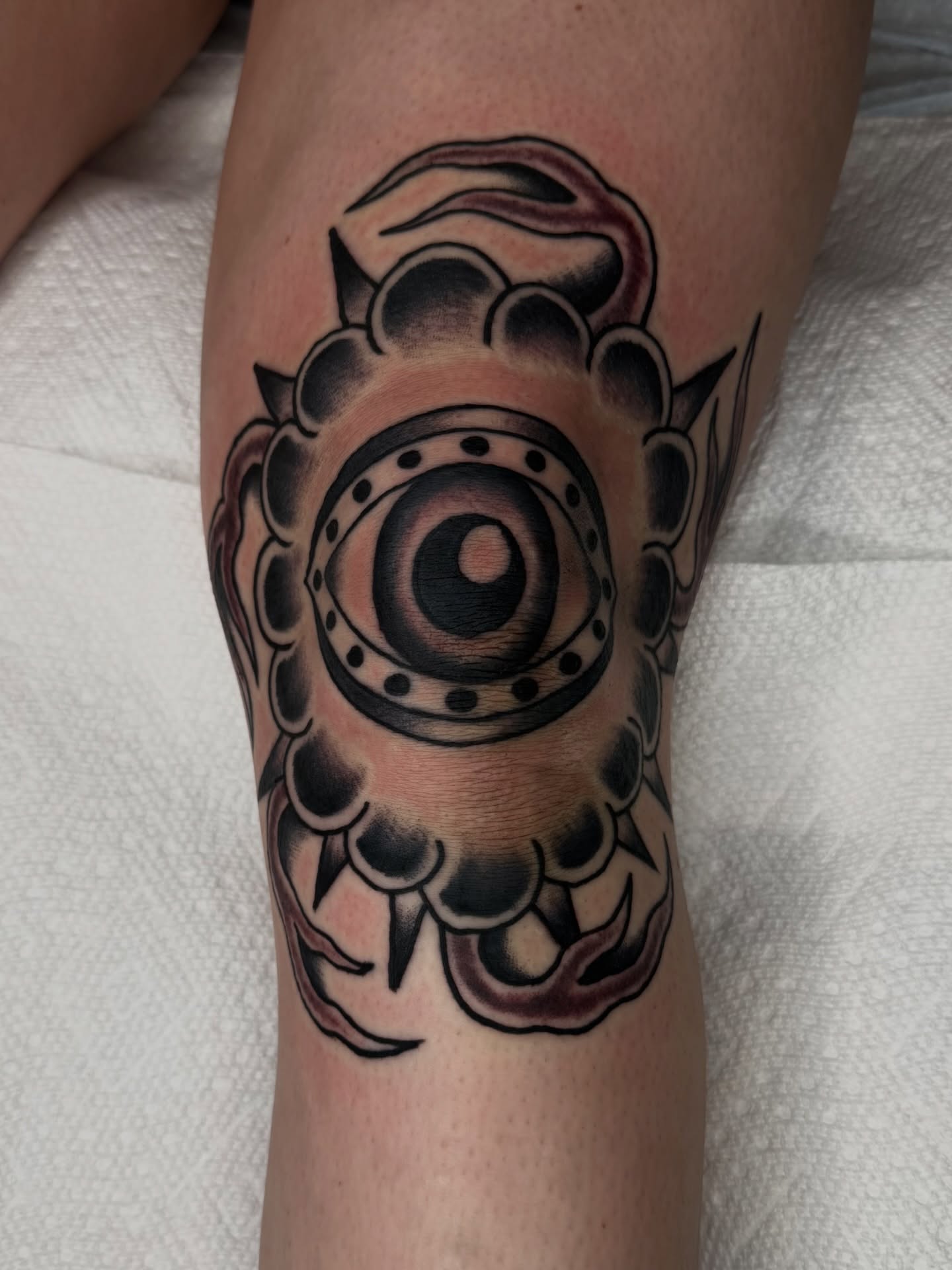 Eye with gear American traditional tattoo on the forearm by Noah Diffenderfer, Phoenix, Arizona