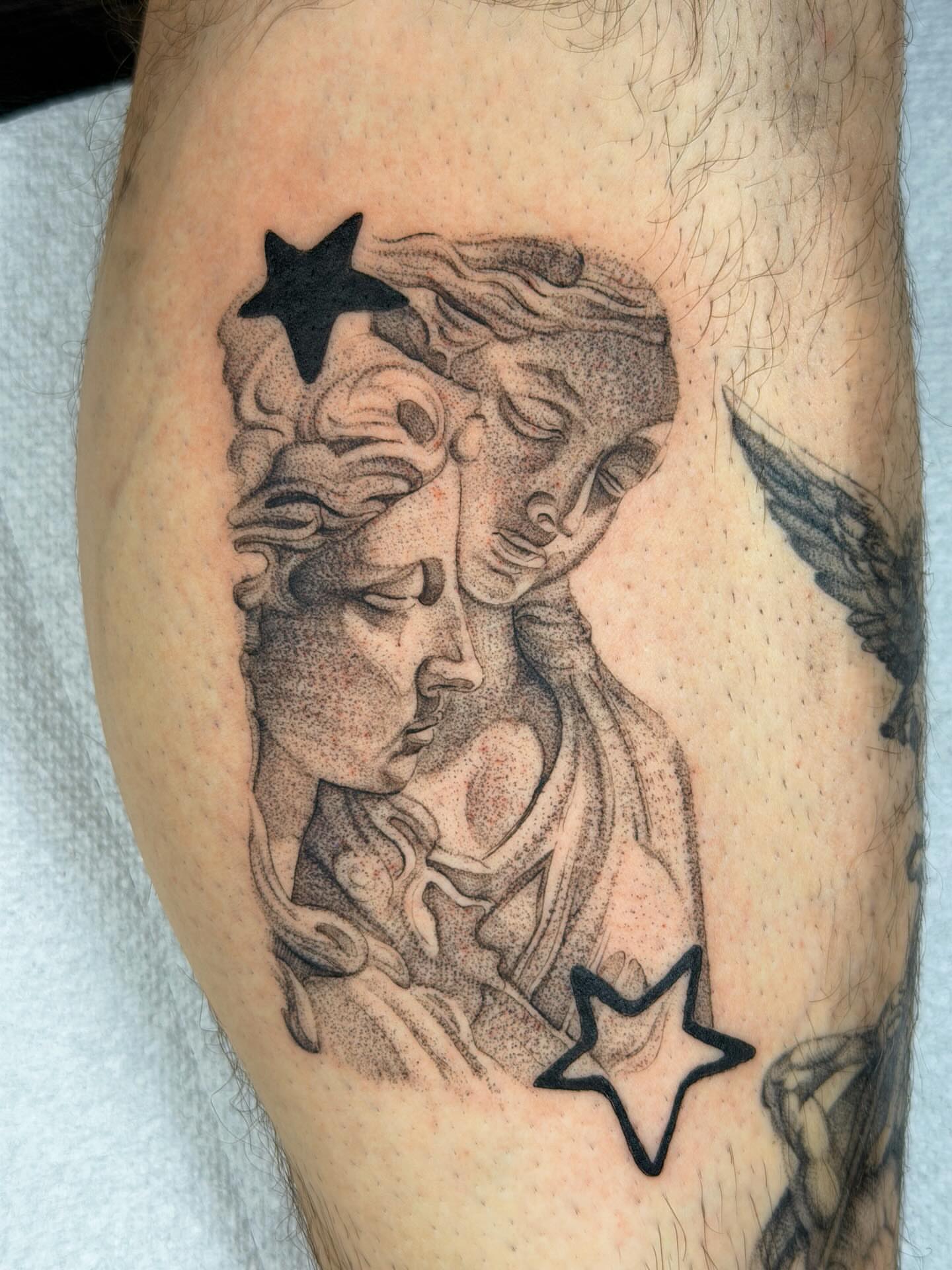 Statue faces dotwork tattoo on the forearm by Nate Weaver