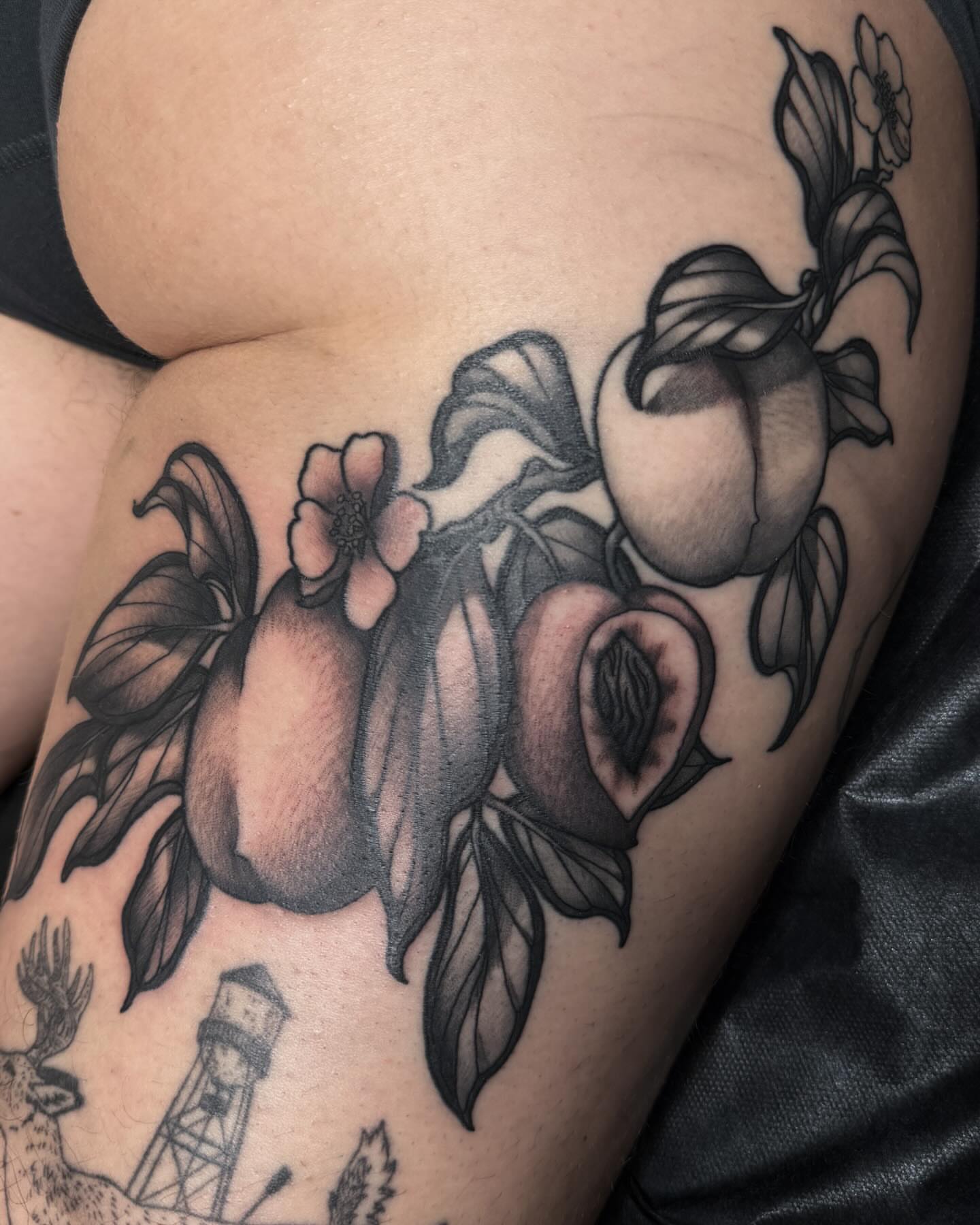 Peaches and blossoms realism tattoo on the shoulder by Monica Amneus