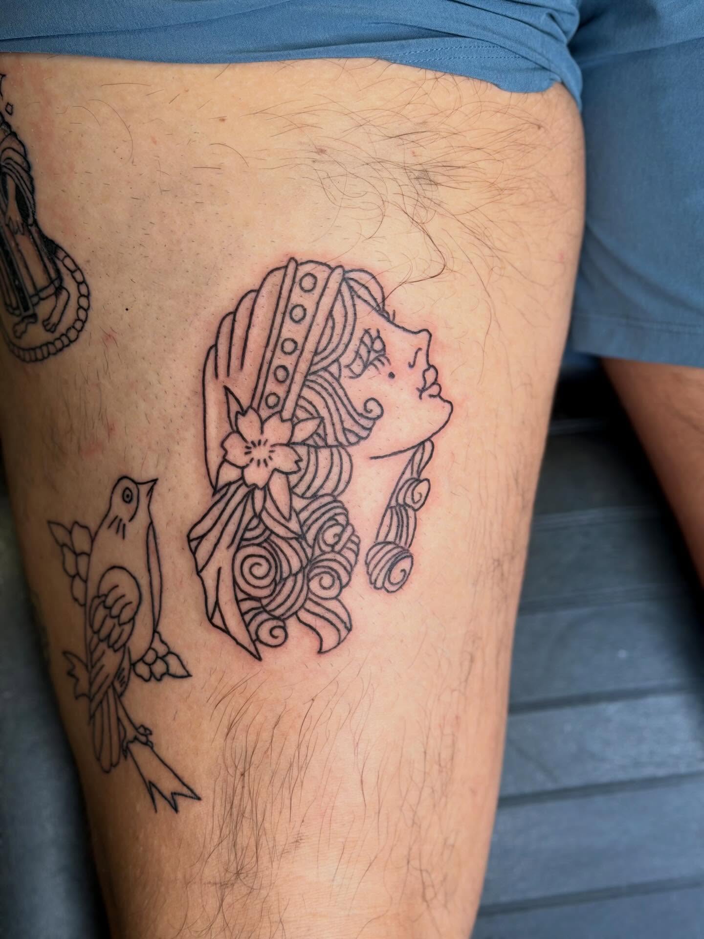 Woman with bird American traditional tattoo on the thigh by ♱ C ♱, Dallas, Texas