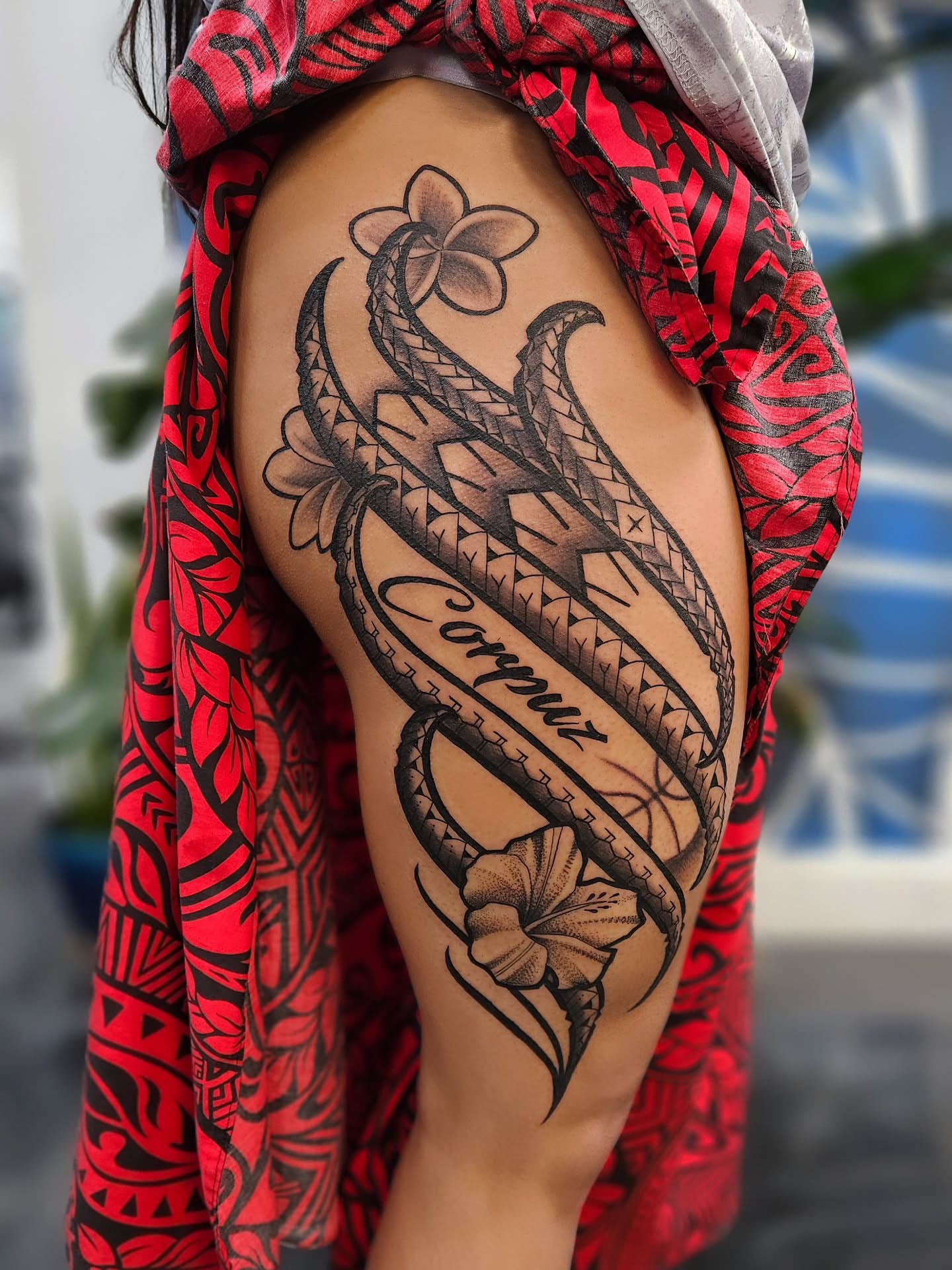 Floral and snake tribal tattoo on the shoulder by Jo'el Acoba