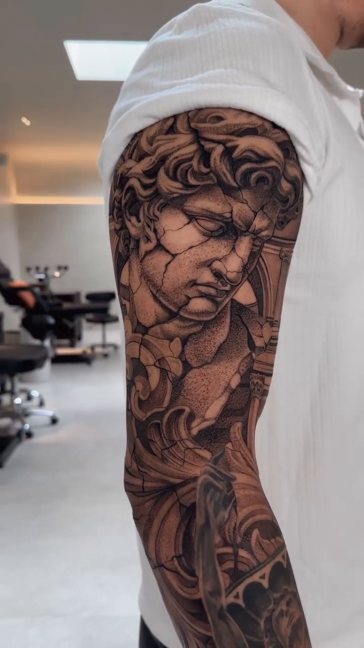 Bust of David realism tattoo by Viktor Govorukhin