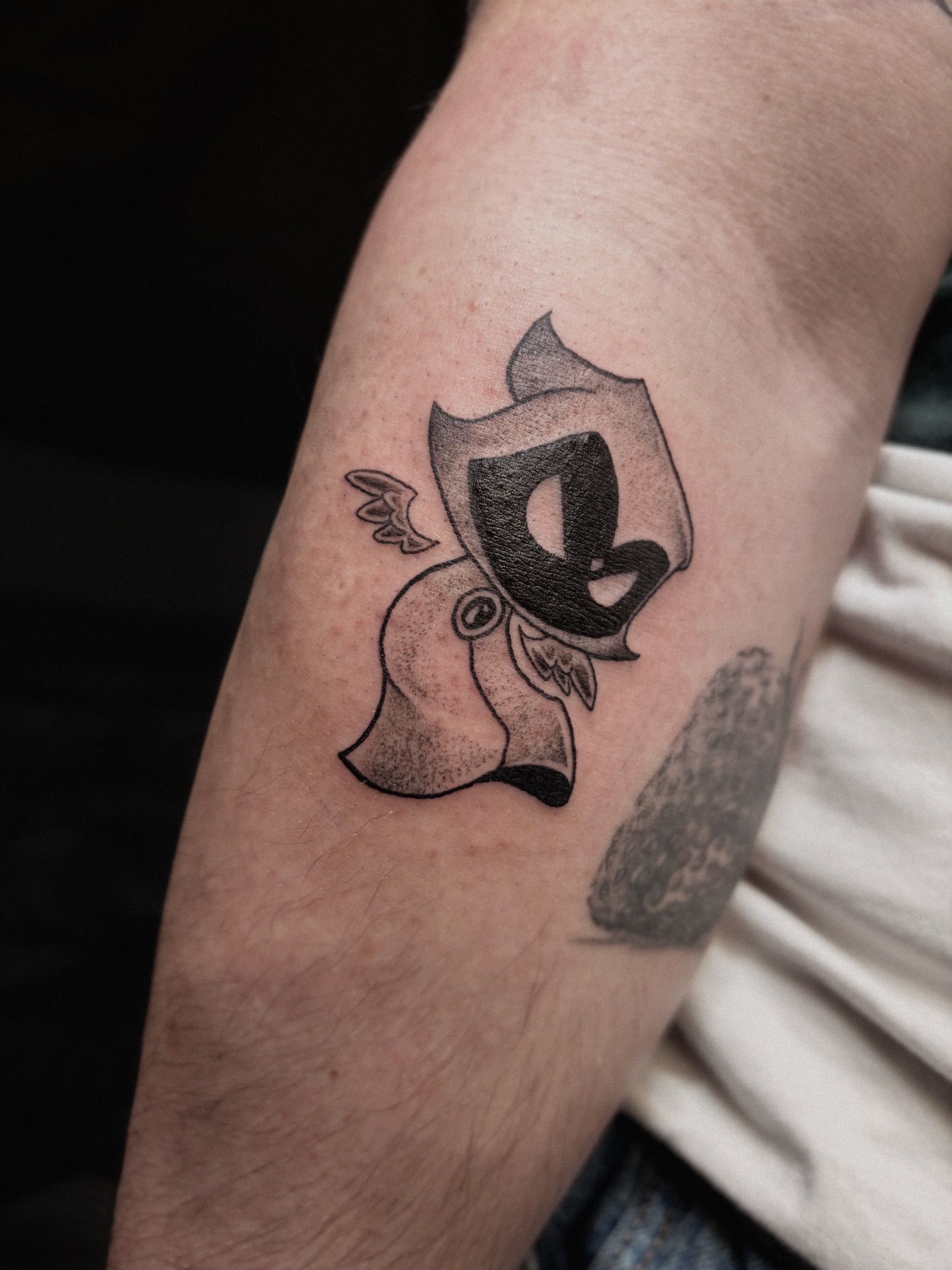 Mask and shield dotwork tattoo on the forearm by ๐ฎ๐๐๐๐๐๐๐๐๐๐๐ โฑ ๐พ๐๐๐๐ ๐ฟ๐๐๐๐๐