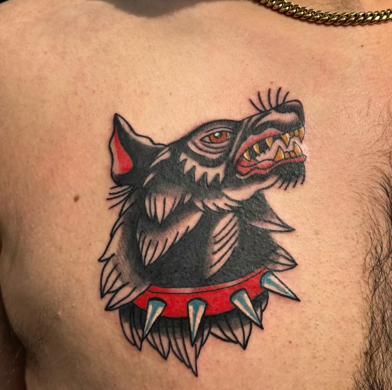 Wolf head American traditional tattoo on the chest by 🌛 𐌀𐌋𐌄𐋄𐌉𐌔 🌜