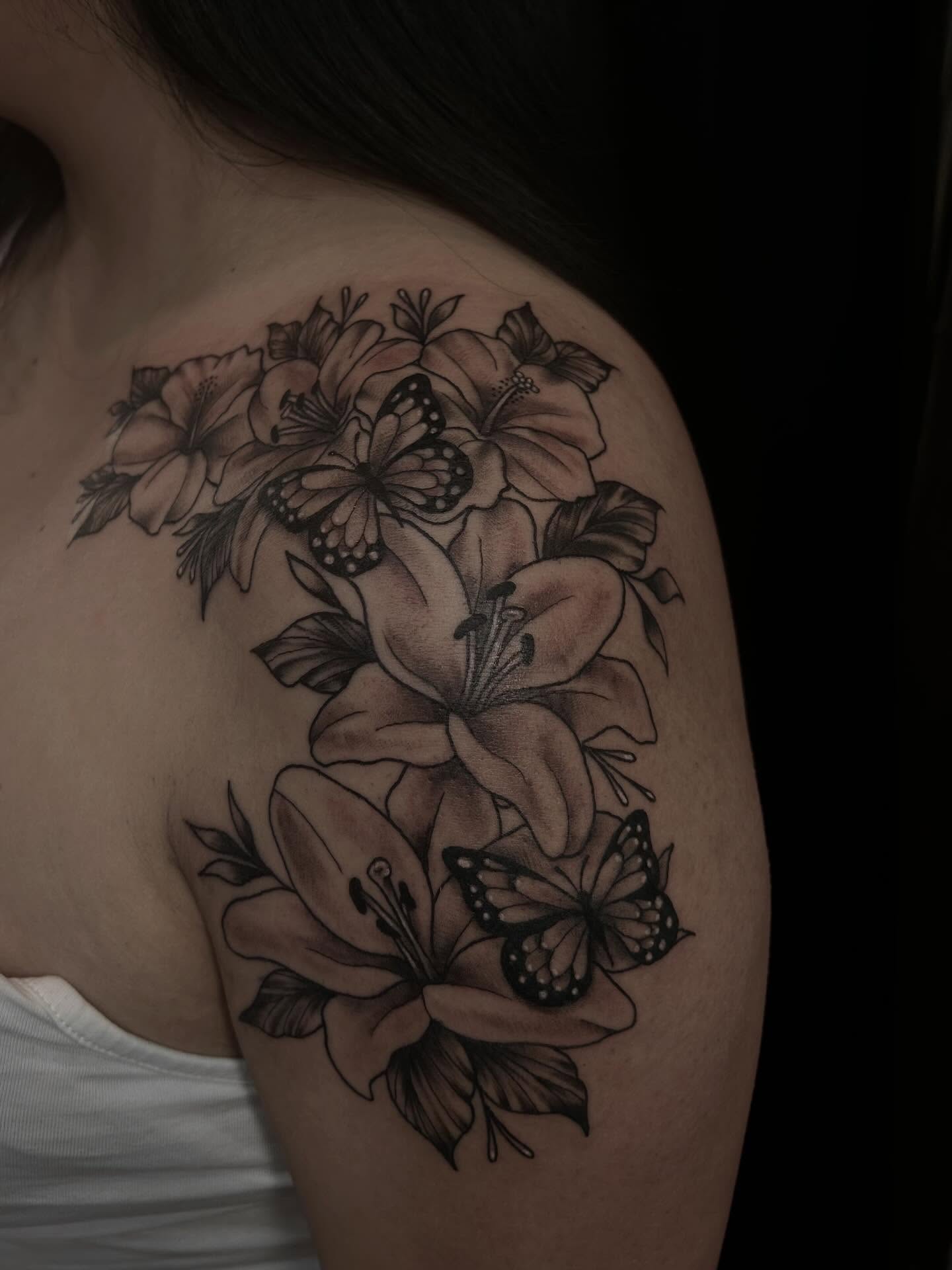 Flowers and butterflies realism tattoo on the shoulder by abby ☽ marie