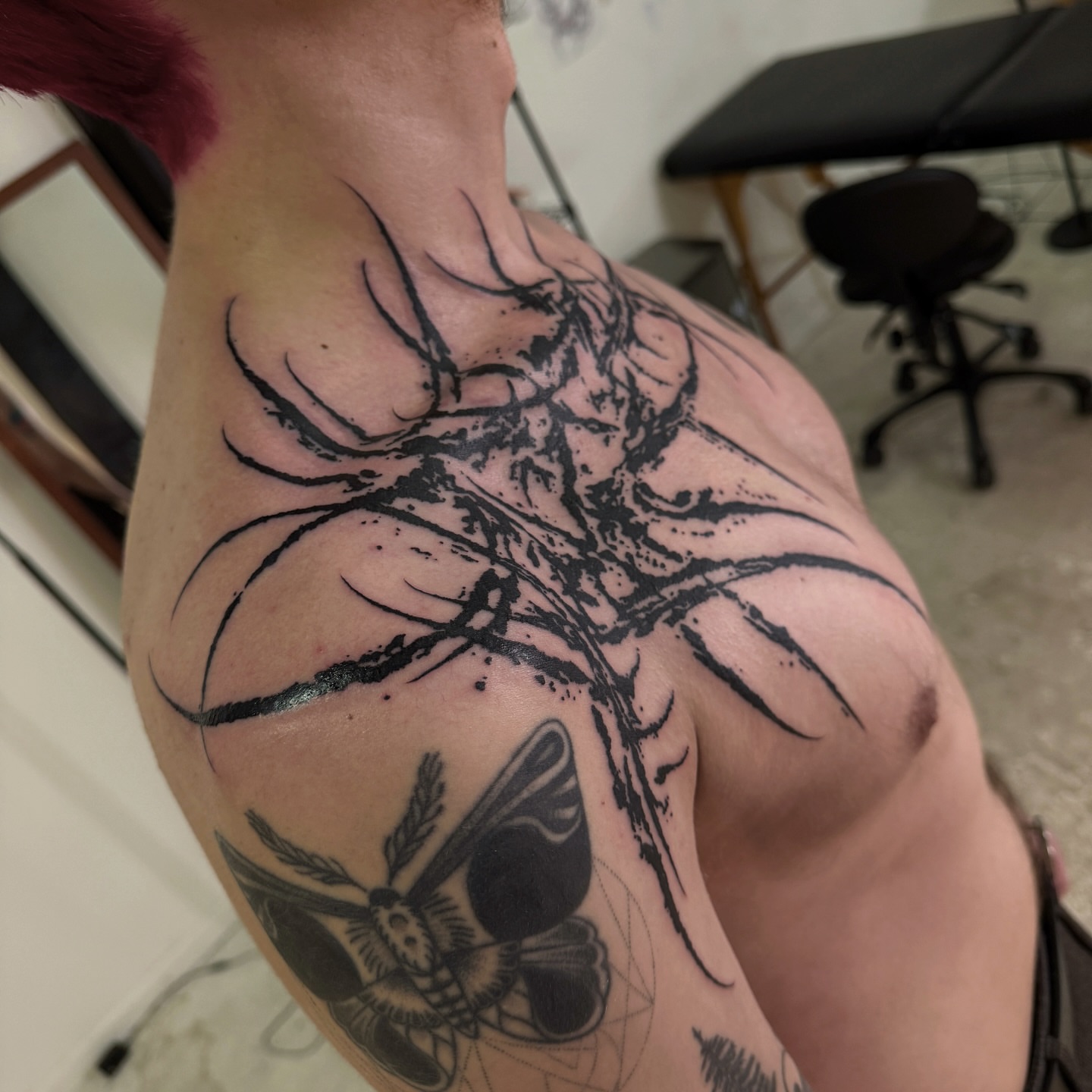 Tree and moth black and grey tattoo on the shoulder by Penelope