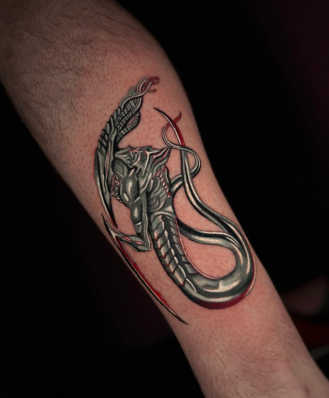 Biomechanical creature realism tattoo on the forearm by Mel