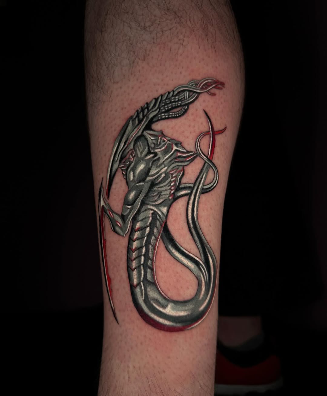 Biomechanical dragon realism tattoo on the forearm by Mel