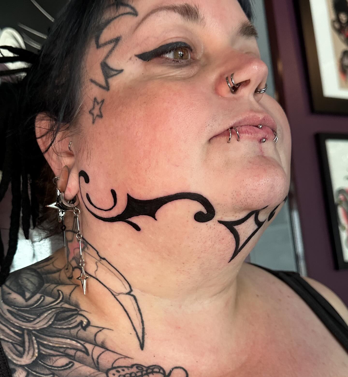 Tribal tribal tattoo on the neck by Stacey Colangelo