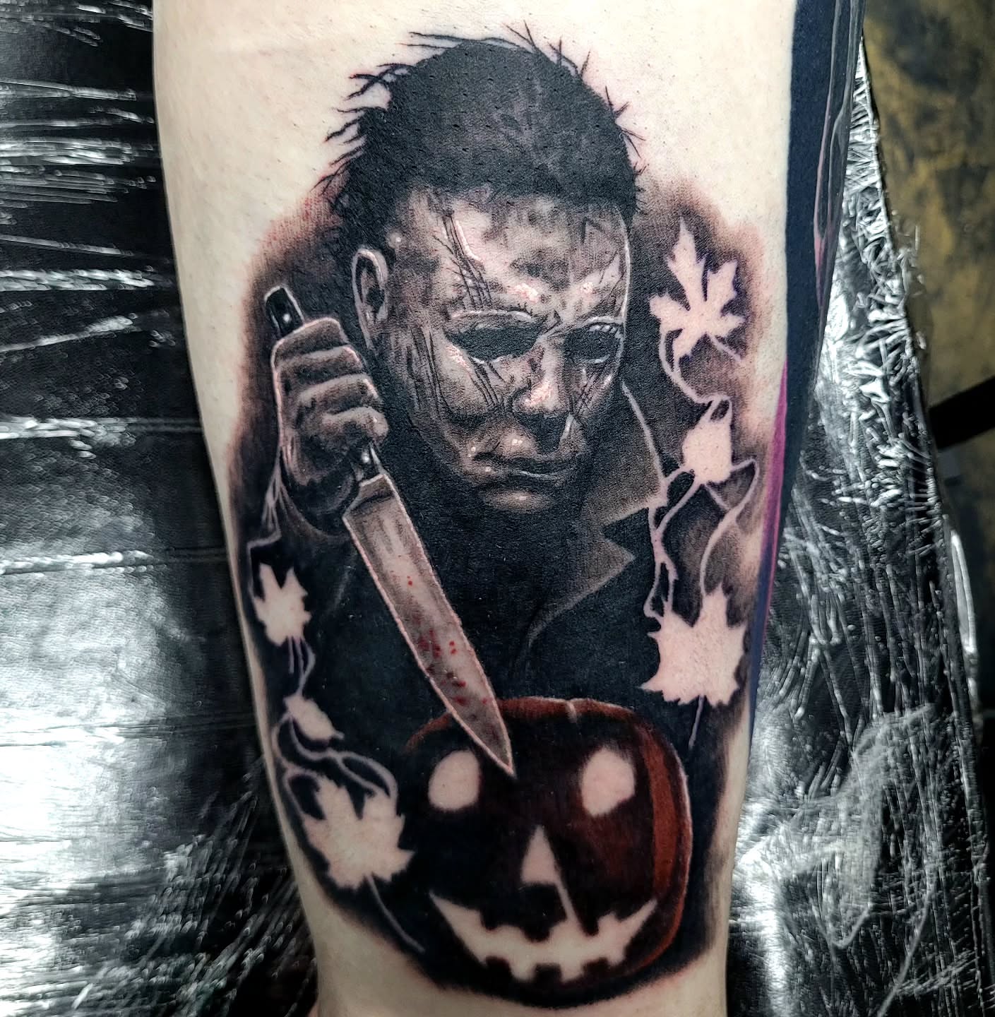 Michael Myers realism tattoo on the forearm by Jentrey McCausland