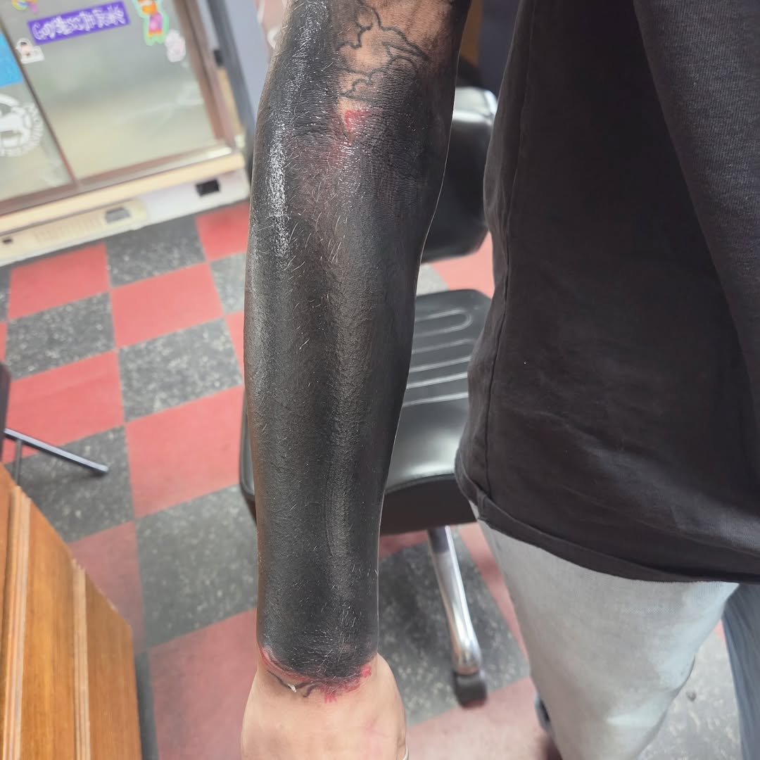 Blackout sleeve tribal tattoo on the upper arm by CASEY JENSEN ✨ Fort Collins CO