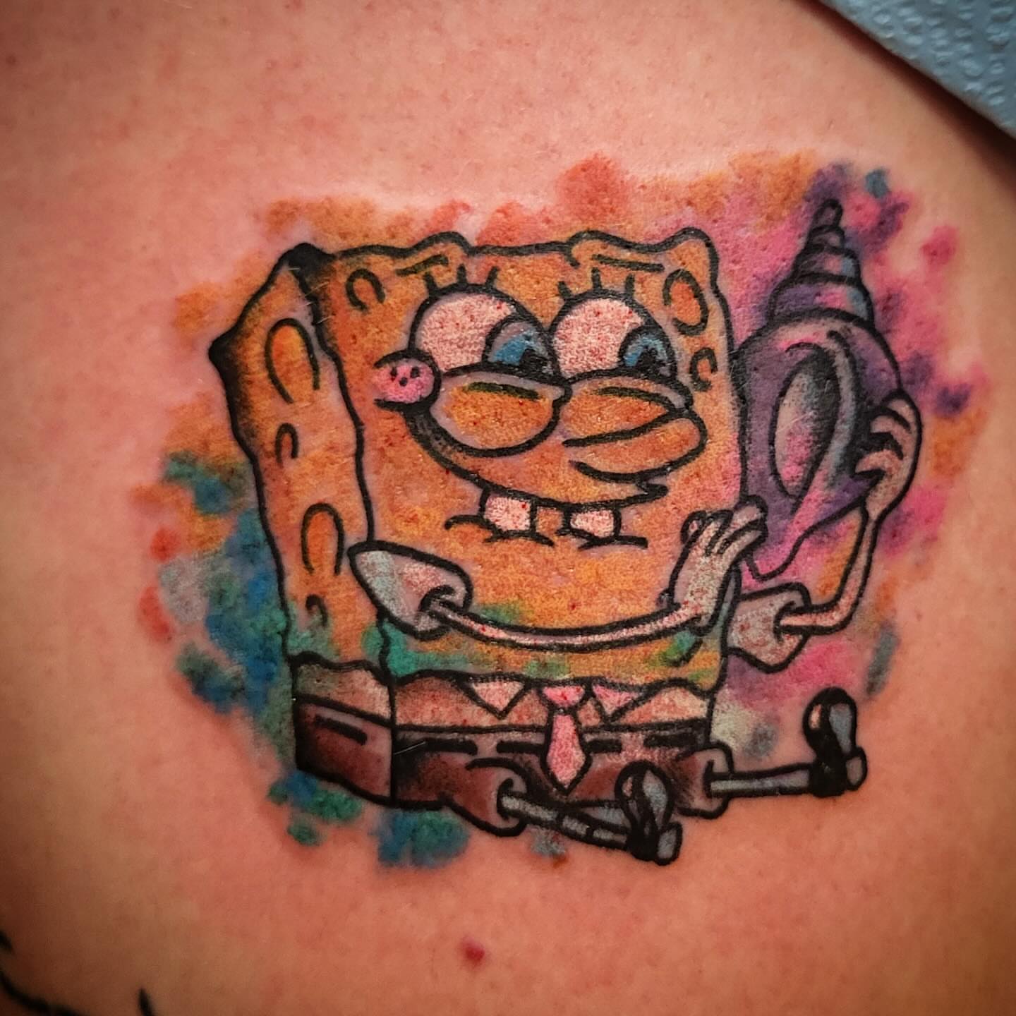 SpongeBob SquarePants watercolor tattoo on the torso by joe martinez, Denver, Colorado