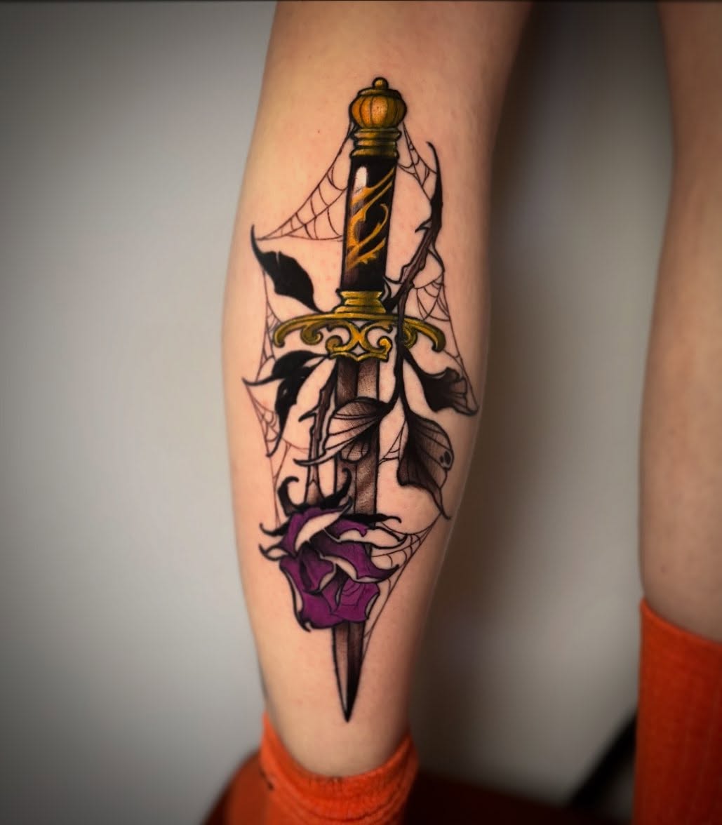 Sword and roses neo-traditional tattoo on the forearm by Riley Borne