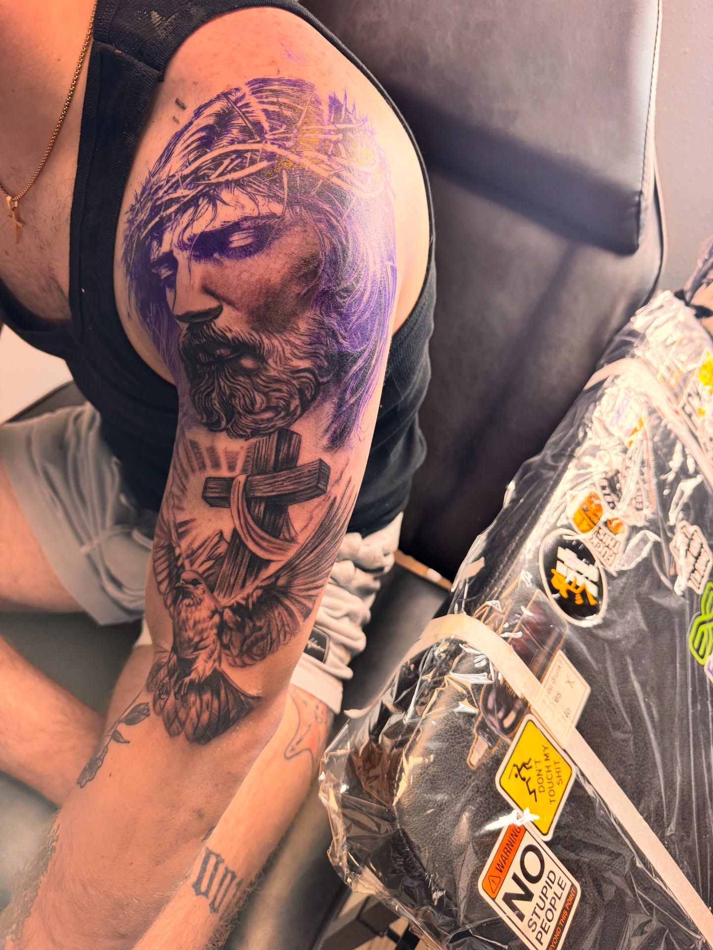 Religious figure realism tattoo on the forearm by Tampa tattoo artist