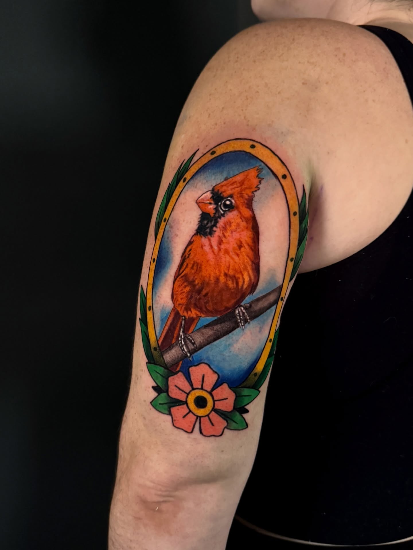 Cardinal bird American traditional tattoo on the shoulder by Dallas Tattoo Artist