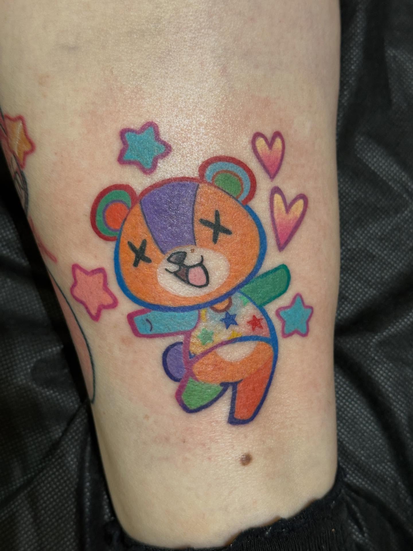 Kawaii bear new school tattoo on the forearm by Dustin Hughes