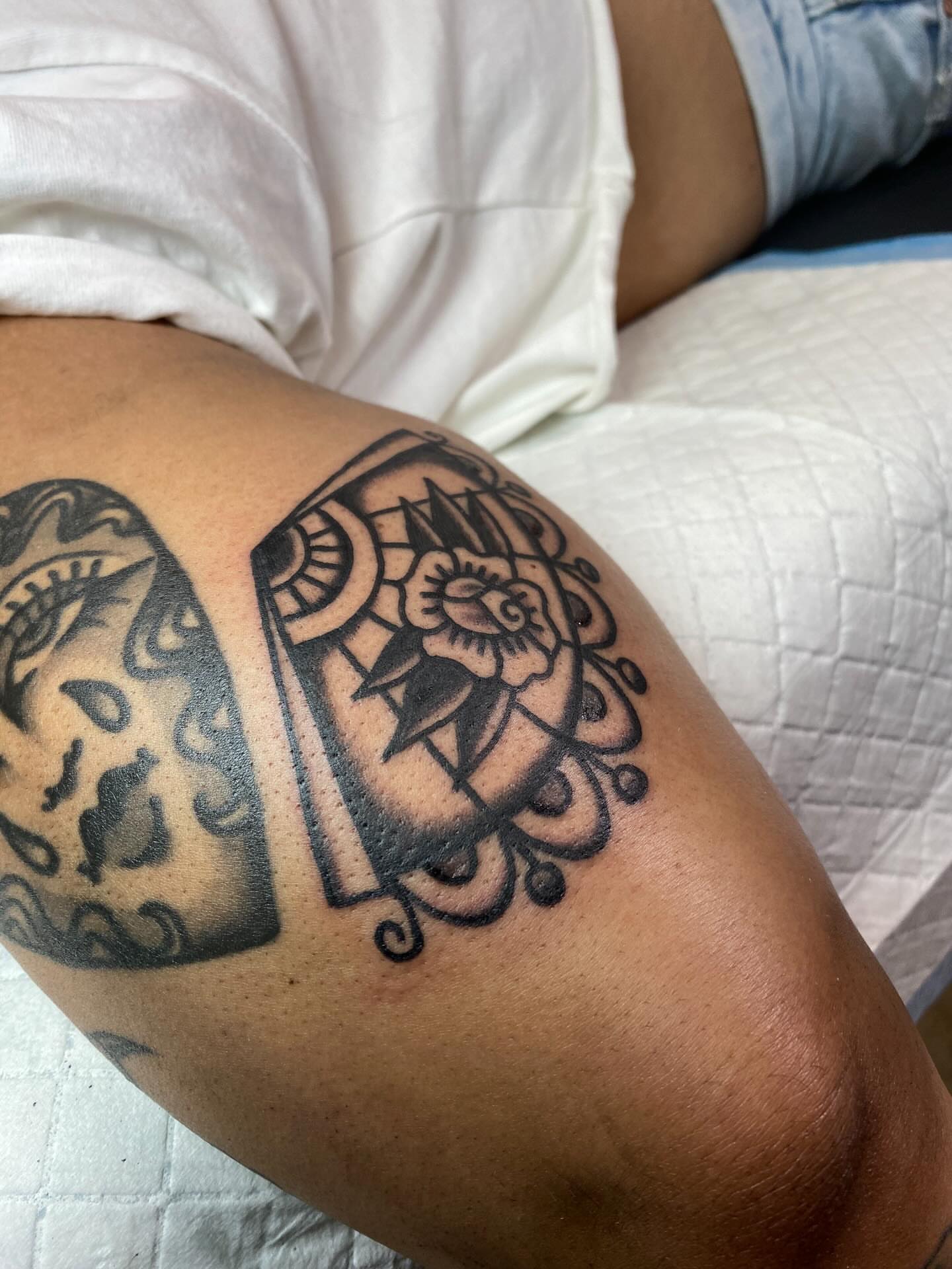Sugar skull and compass American traditional tattoo on the thigh by @rubber_band_dan, San Francisco, California