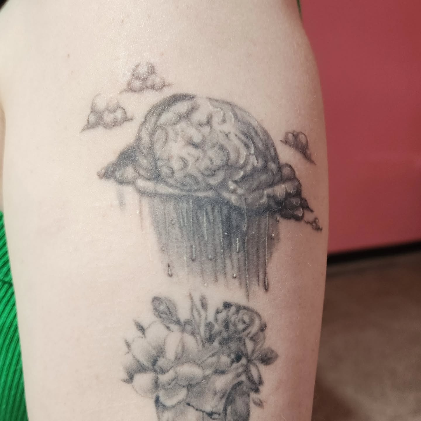 Rainbow brain realism tattoo on the forearm by K.F. Golden