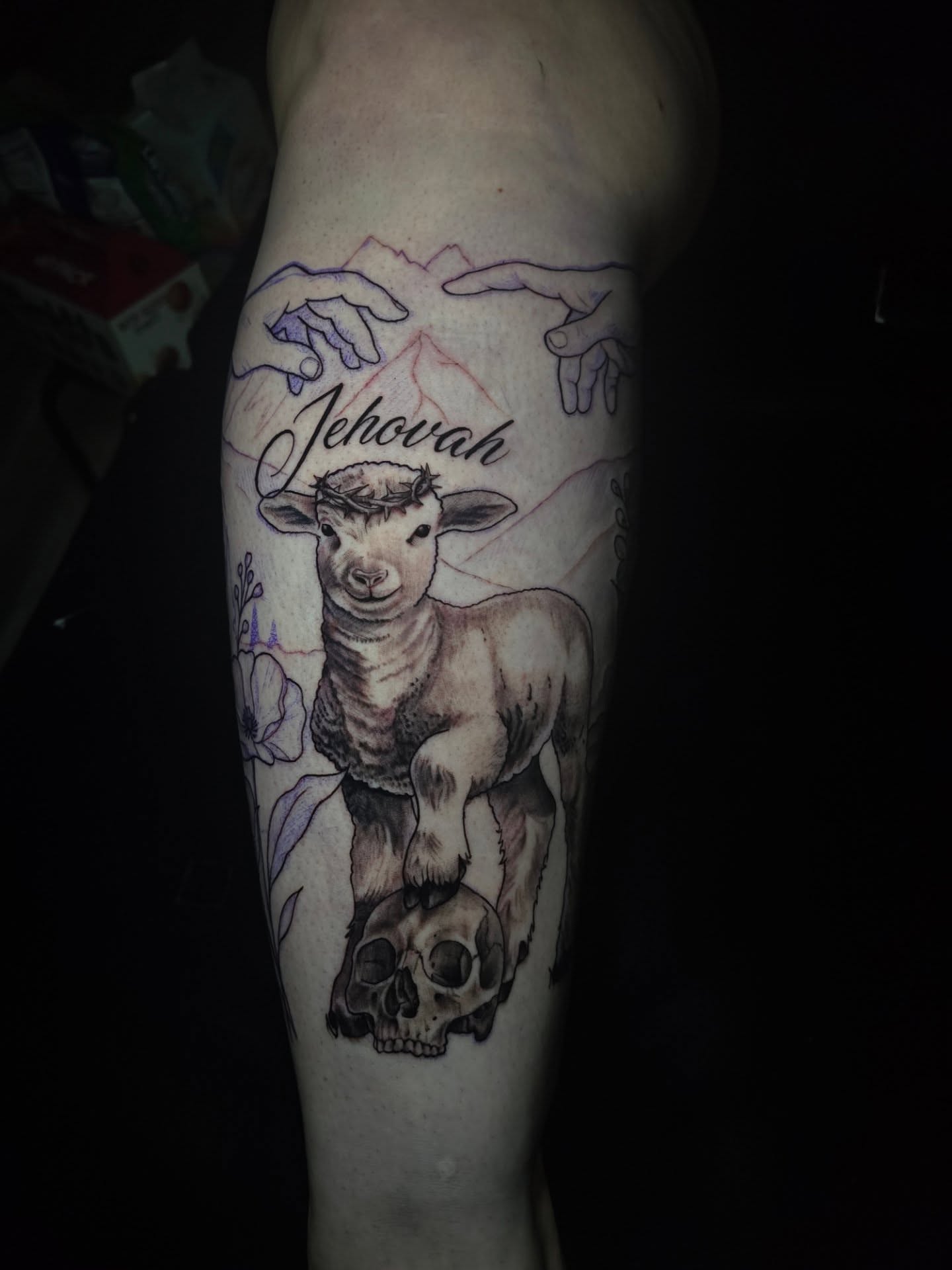 Lamb and skull realism tattoo on the forearm by Camuel Whaley