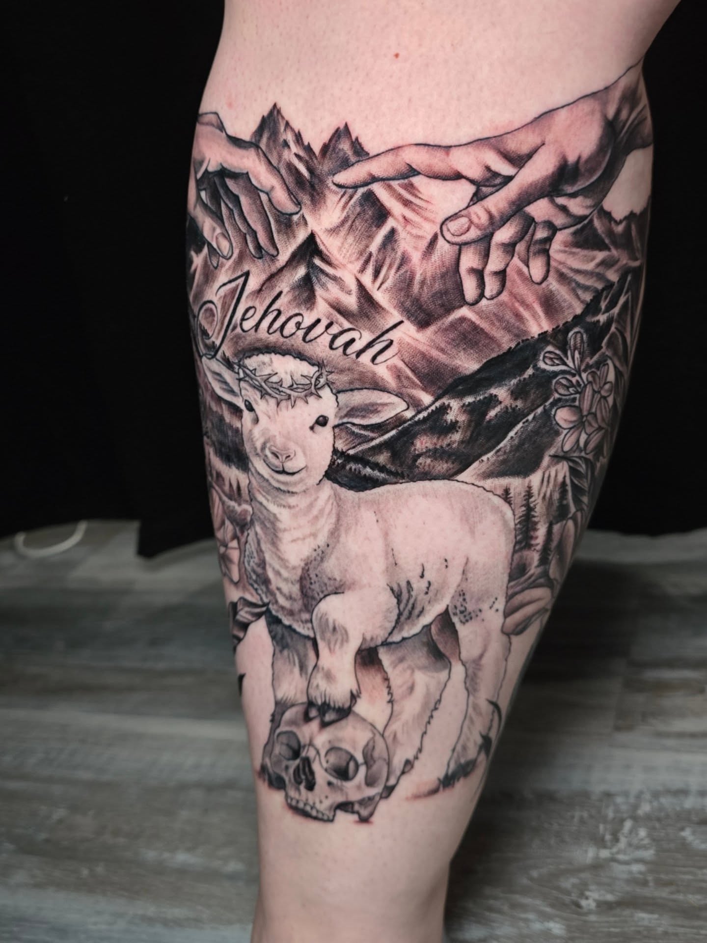 Sheep and skull realism tattoo on the calf by Camuel Whaley