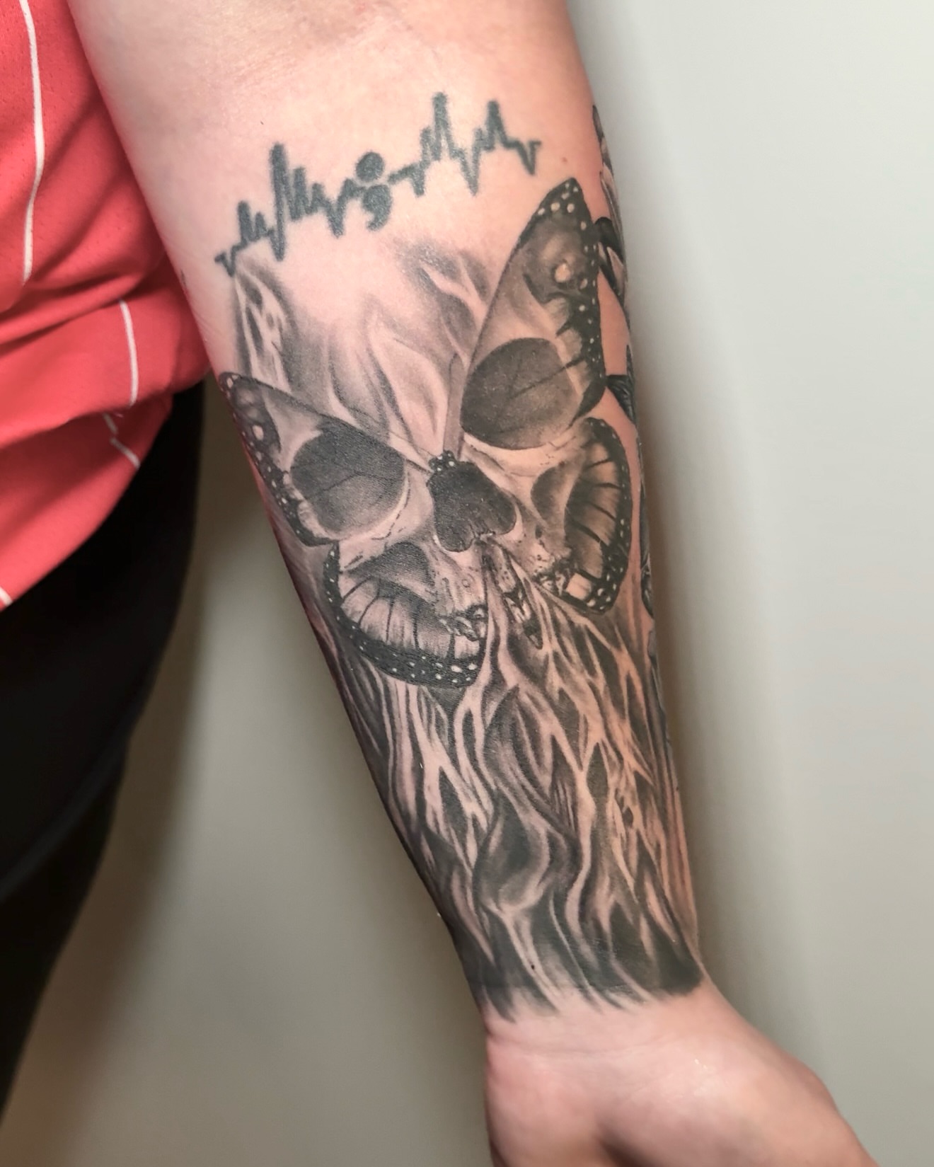 Skull with butterflies realism tattoo on the forearm by Tattoos by Katherina, Willoughby, Ohio