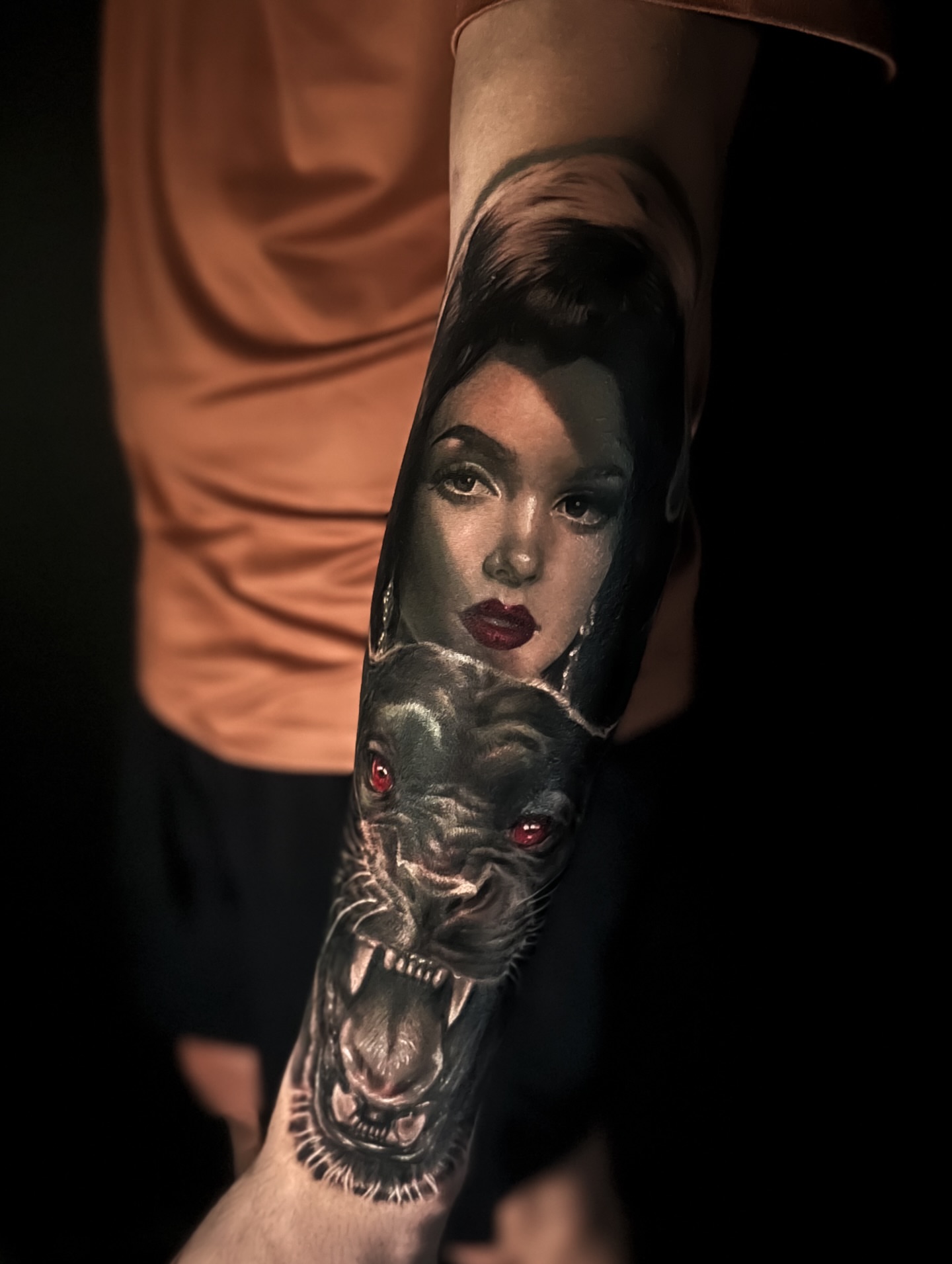 Woman with dog realism tattoo on the forearm by Sincere