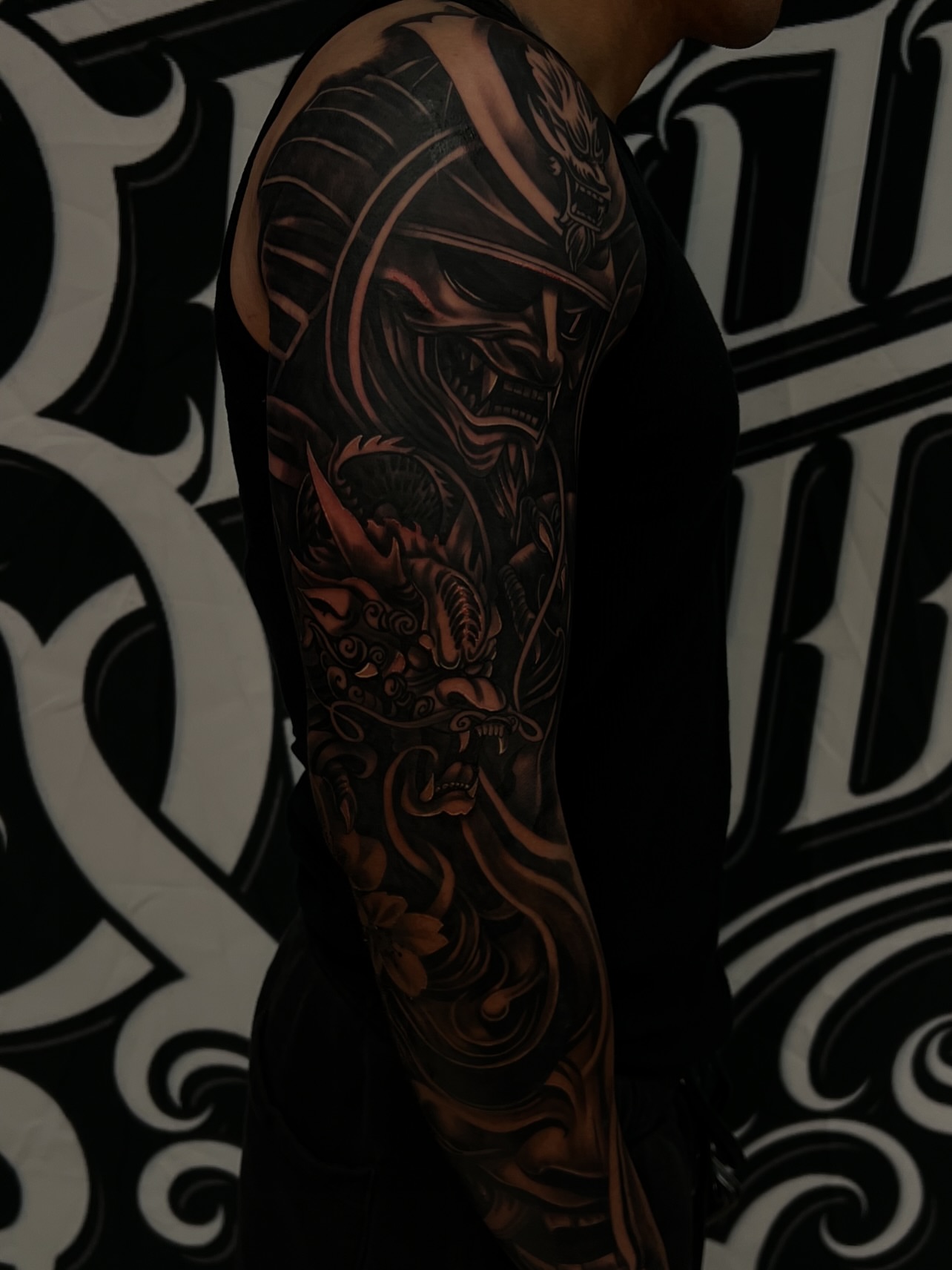 Samurai helmet and dragon japanese irezumi tattoo on the forearm by Daniel Michael Perez