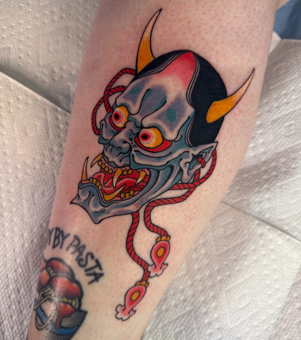 Demon skull American traditional tattoo on the forearm by Scott Kulikowski