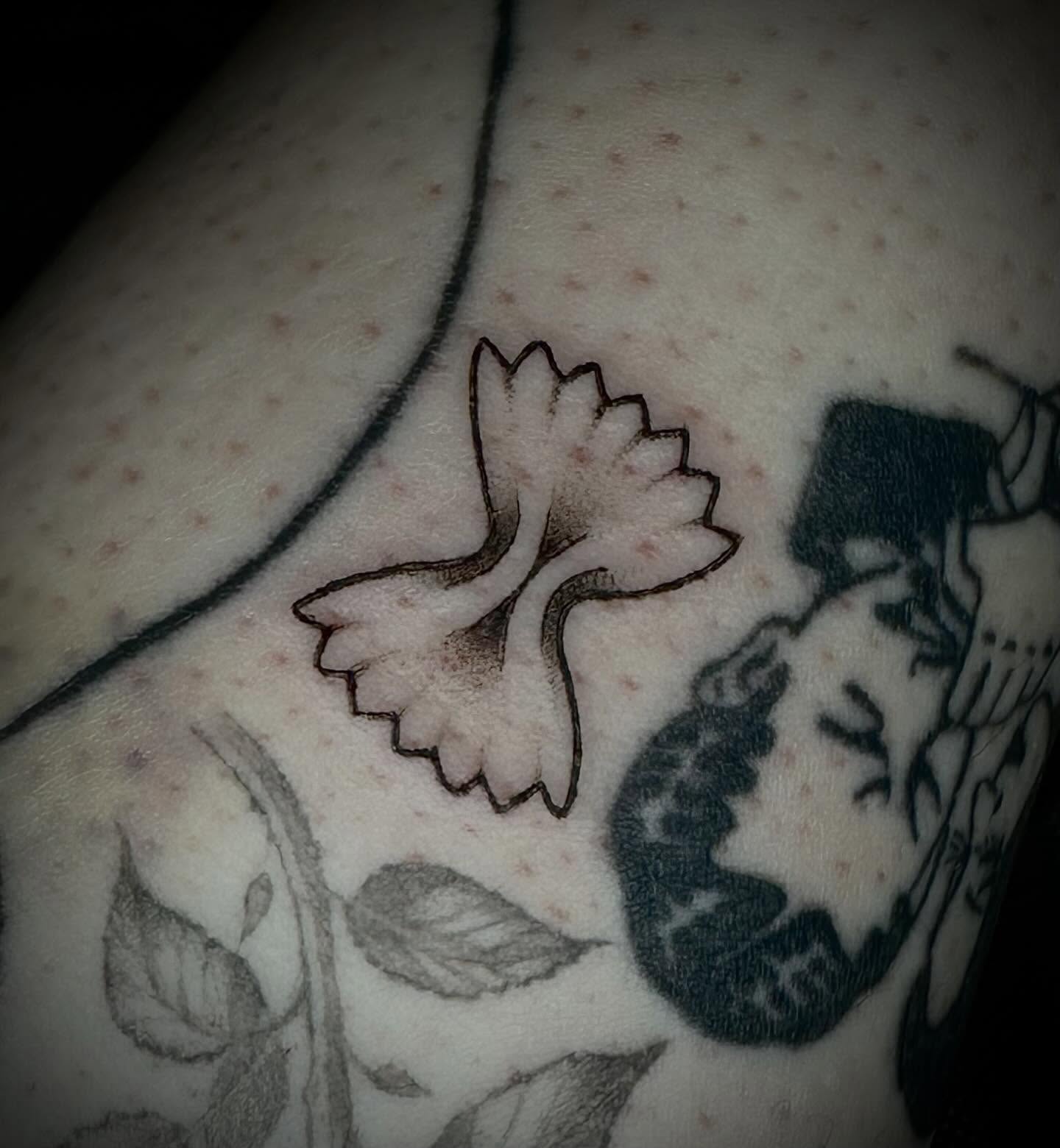 Grapevine black and grey tattoo on the shoulder by emma christine