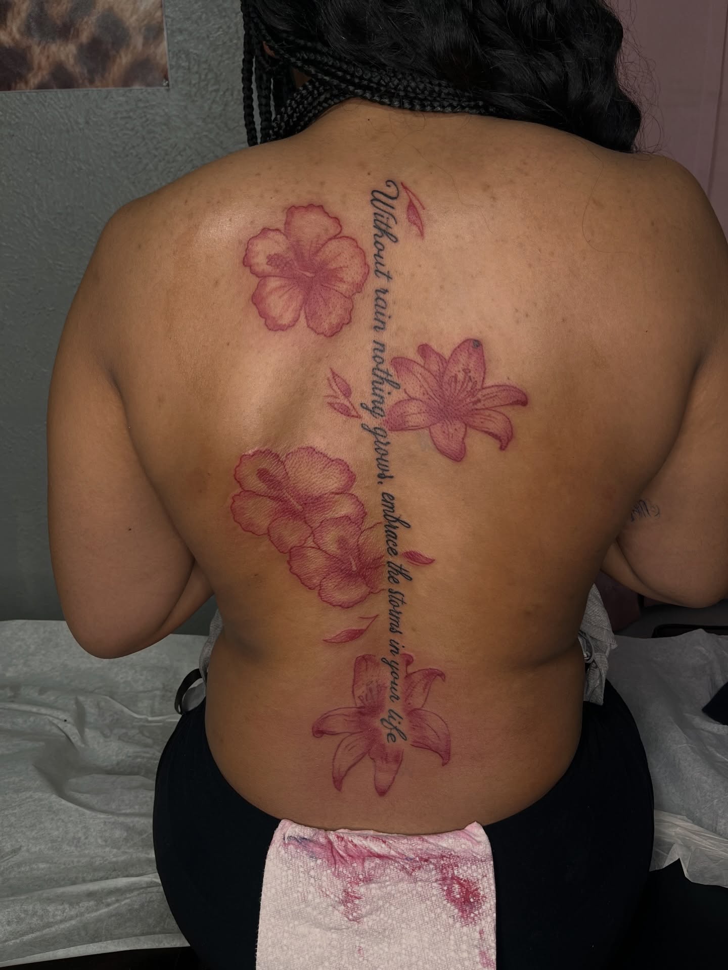 Flowers and quote dotwork tattoo on the back by The inspo