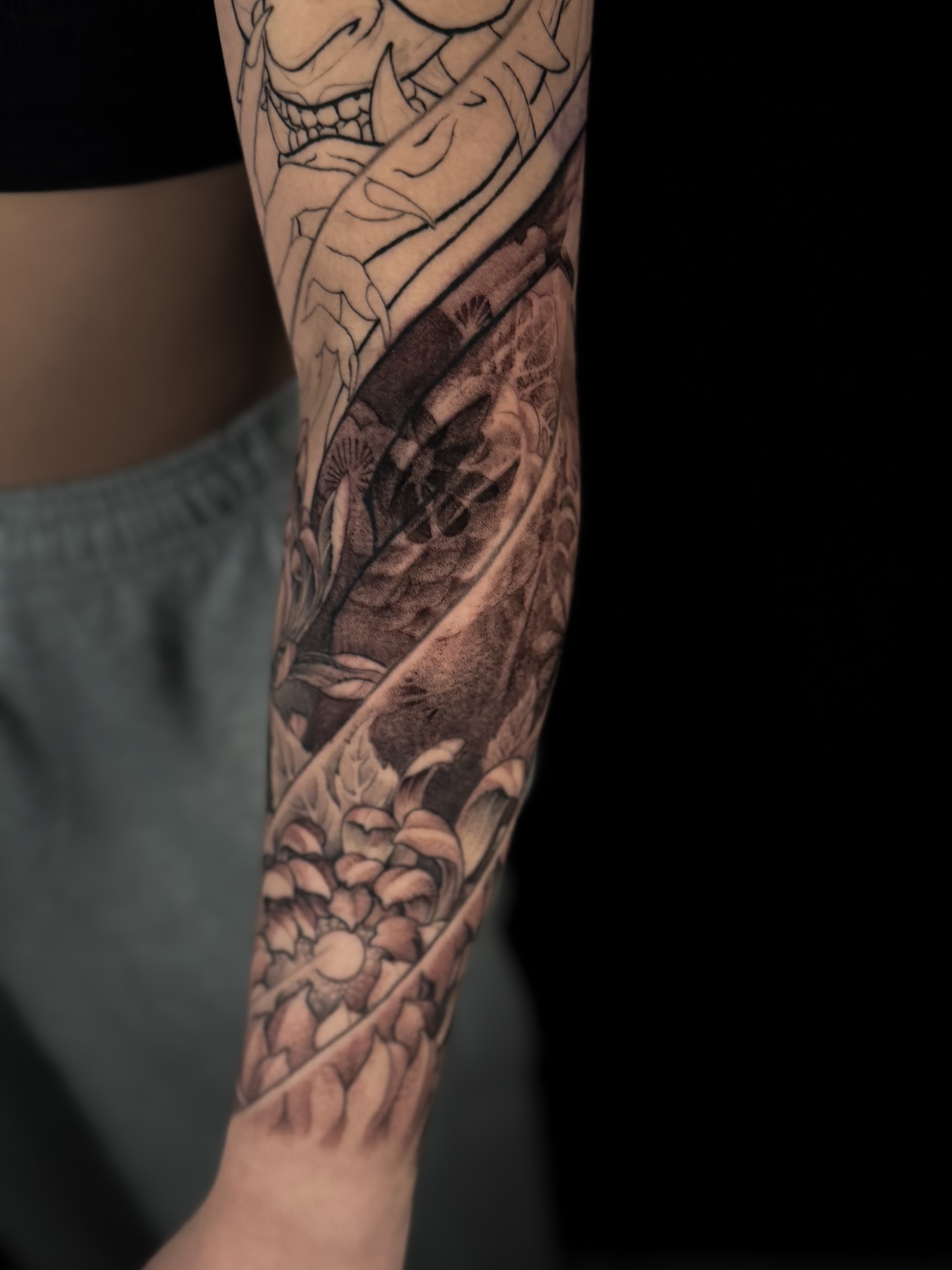 Skull and sword japanese irezumi tattoo on the forearm by Vince Lau