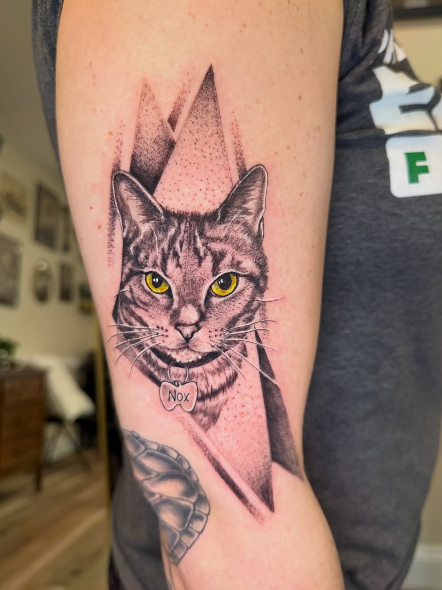 Cat dotwork tattoo on the forearm by McKenna