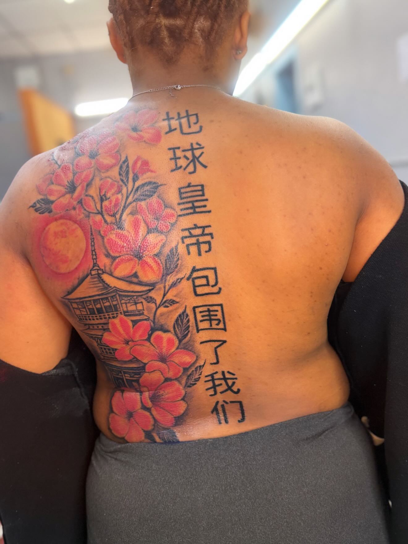 Cherry blossoms and pagoda japanese irezumi tattoo on the back by JAE, Shreveport, Louisiana