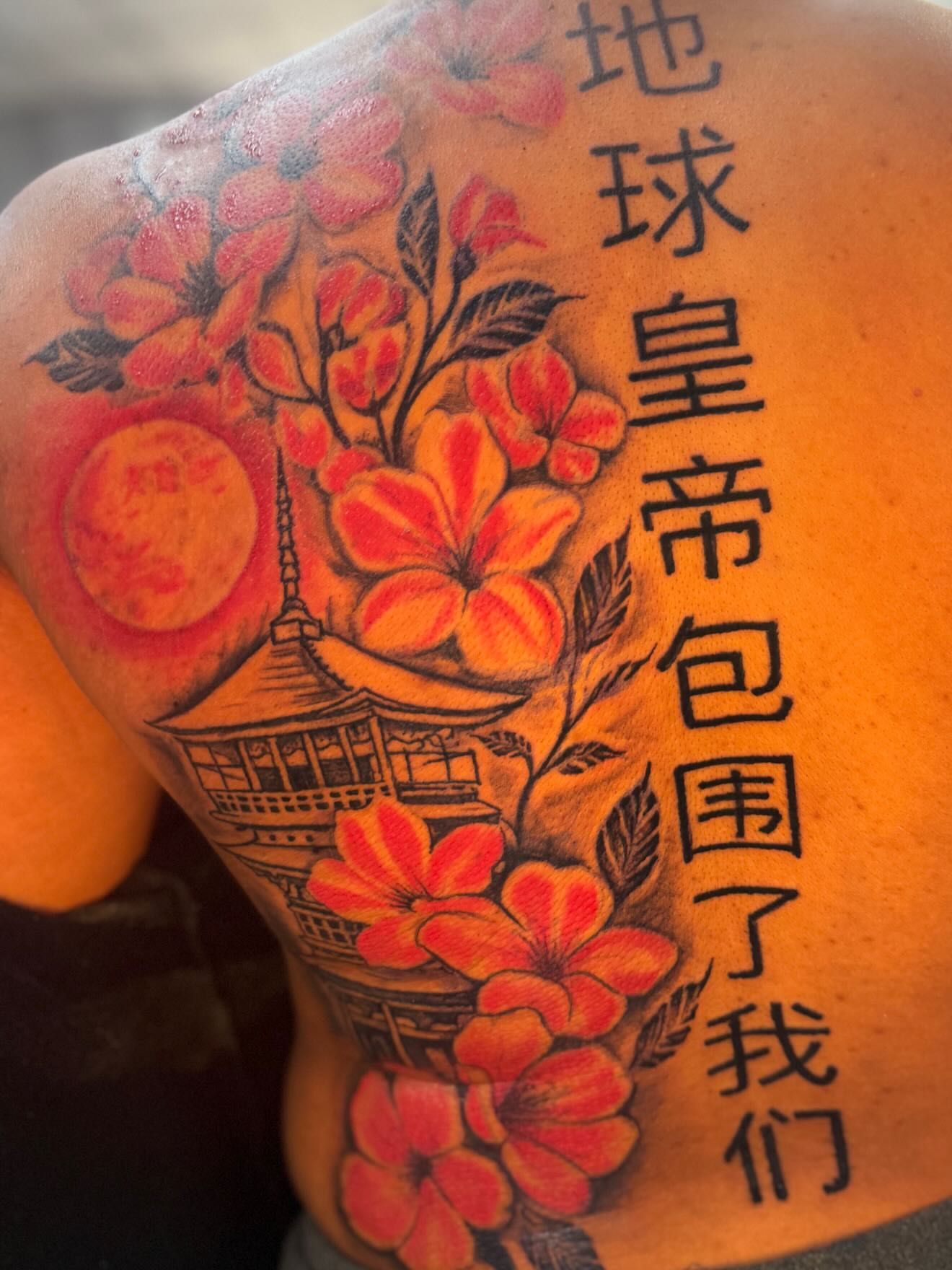 Cherry blossoms and pagoda japanese irezumi tattoo on the shoulder by JAE, Shreveport, Louisiana