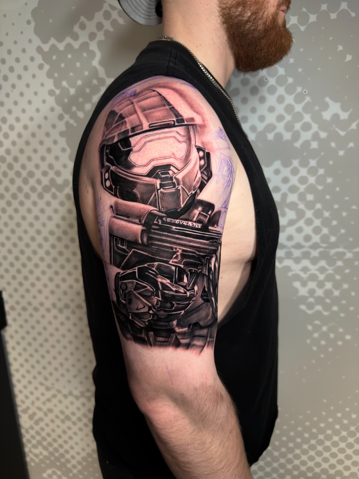 Halo helmet realism tattoo on the shoulder by Charlotte Tattoo Artist