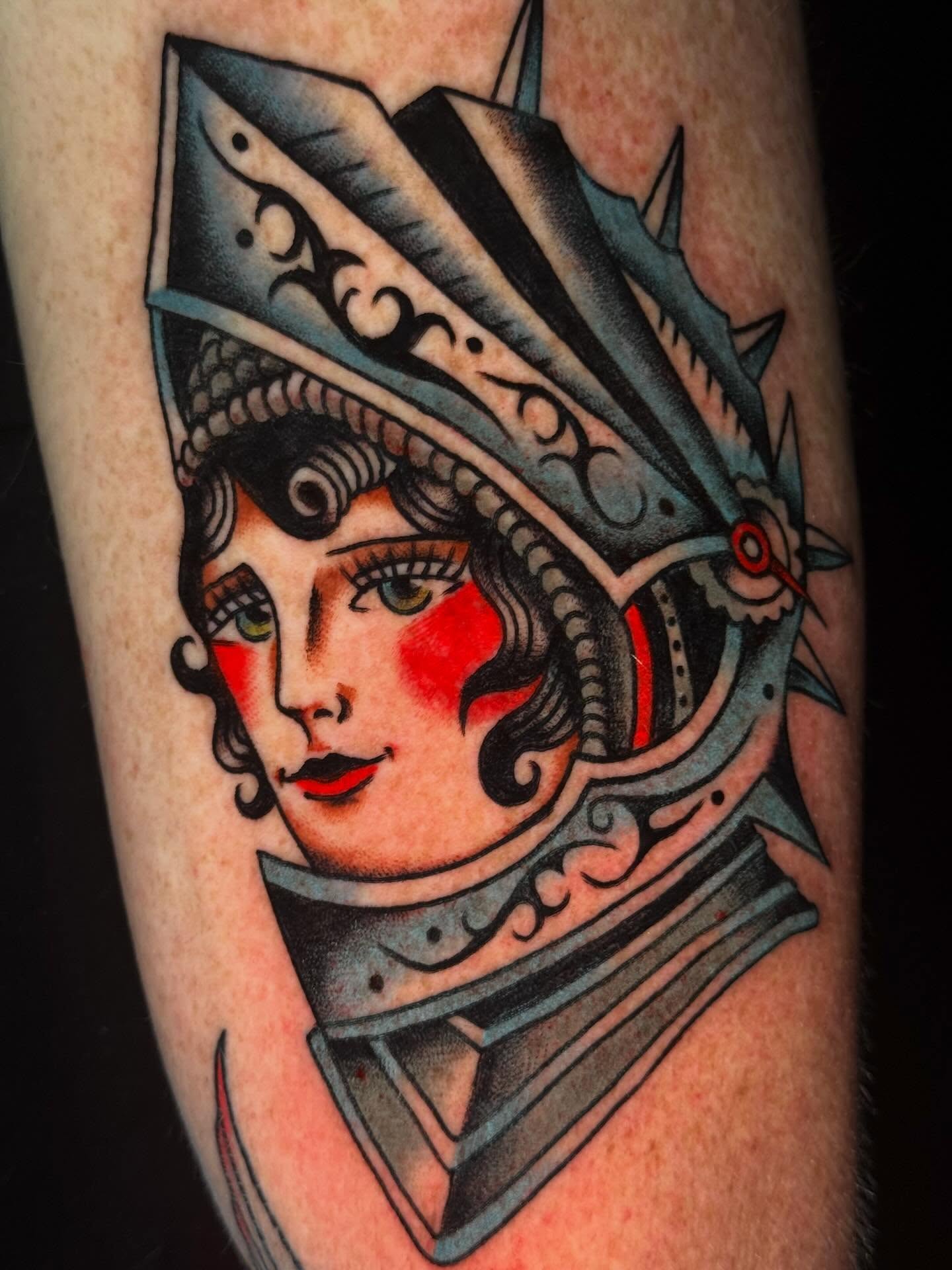 Woman in armor American traditional tattoo on the forearm by Mallory Brown