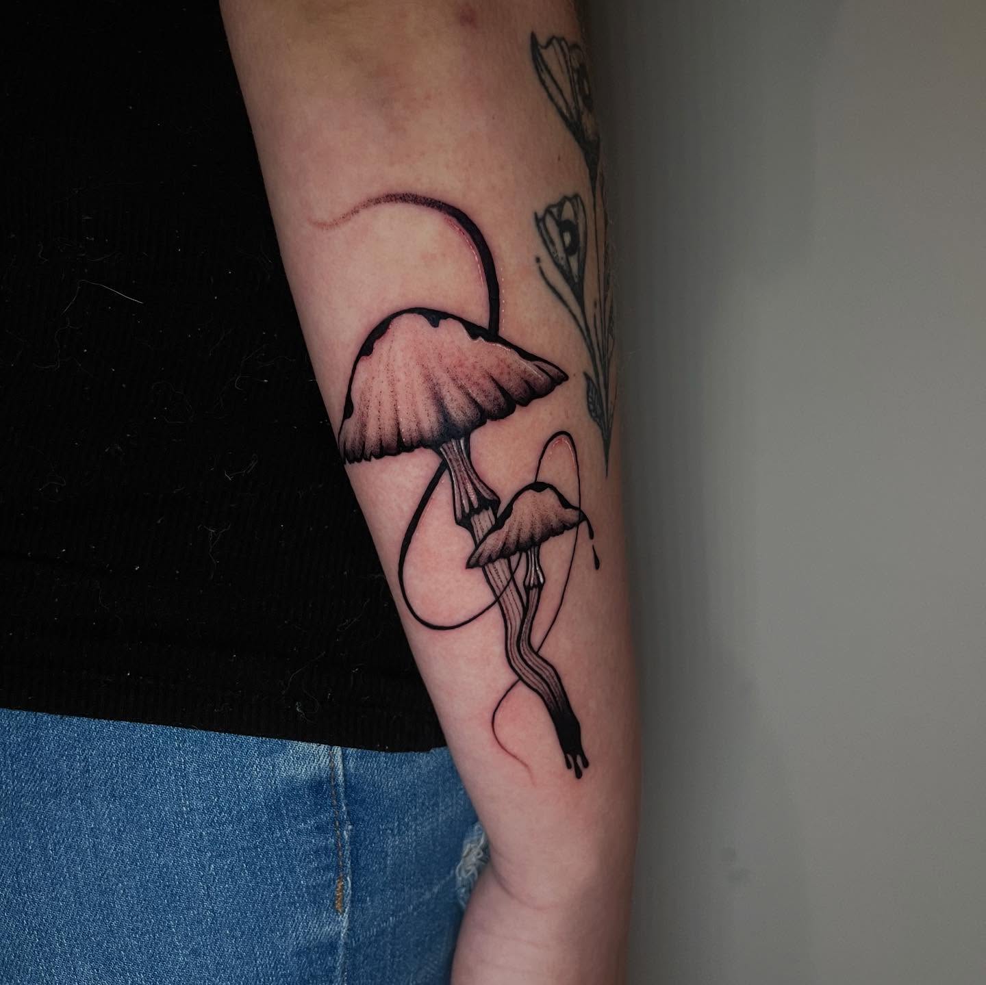 Mushroom black and grey tattoo on the forearm by Elisa
