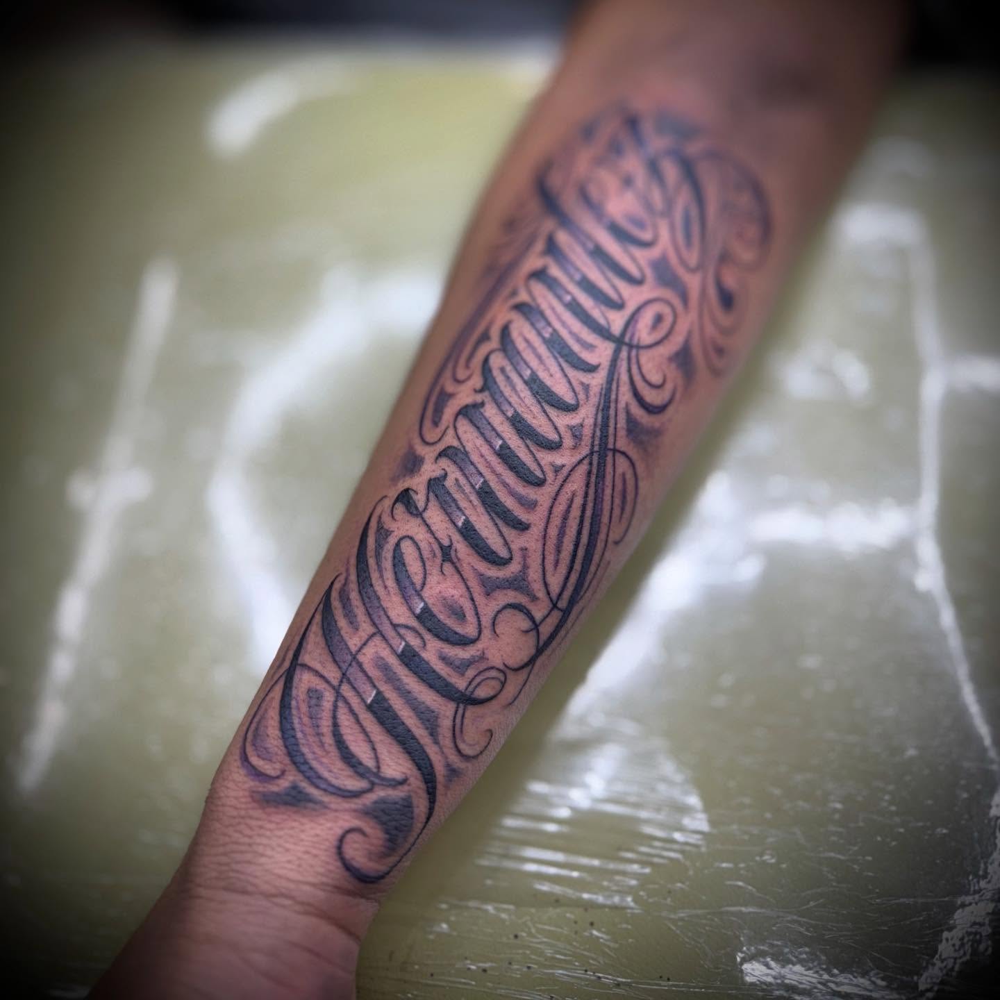 Tattoo by @inkbychuy — lettering_script